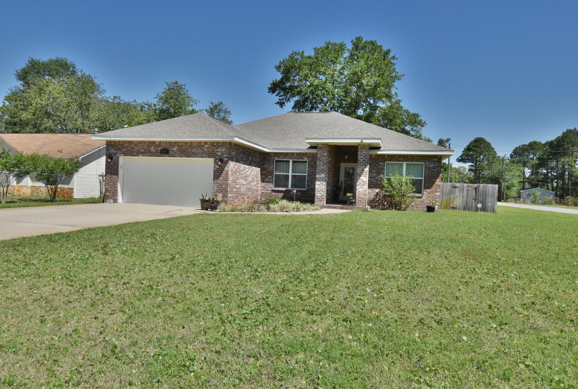 Beautiful Home on large corner lot. Built in 2014. Convenient to Hurlburt Field. It features large open living, dining and kitchen area. Split bedrooms. Large master with trayed ceilings, double vanities in the master bath and spacious shower. Kitchen has stainless steel appliances and granite countertops with breakfast bar area. The large backyard with covered porch is great for entertaining and enjoying the outdoors. Schedule your showing today!