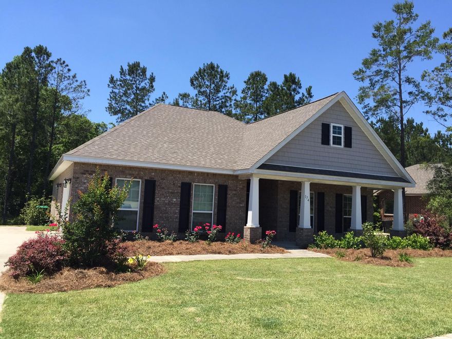 BEST BUY in Hammock Bay! Nicely upgraded! Like new home is situated on a large lot and backs up to the nature preserve. A split floor plan:3 bdrs, 2 baths, w/hardwood flooring, vaulted ceilings, granite counters and expresso cabinetry. The kitchen inc all appliances and offers an open concept to living and dining. The mbdr has a trey ceiling and is large enough to include a sitting area or an office. The exterior is low maintenance, all brick w/hardiplank trim. A side entry garage w/extra parking pad. Great curb appeal w/Professional landscaping, sprinkler system and well. Enjoy the amenities of HBay: clubhouse w/theater, fitness ctr, 2 pools, playgrounds, tennis, basketball, Sports complex and Bayside park. HOA fee is $147/month. New Buyer fee of .5% HBay is in a Community Development D