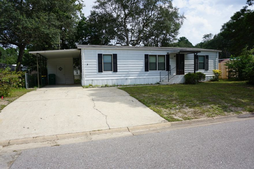 Newley remodeled older mobile home conveniently located just off Bayshore Dr. This wonderful mobile home features a newer AC and water heater. It has just been freshly painted and new flooring installed throughout. All of the lighting and ceiling fans were also upgraded. This spacious home sits on its own lot with a large deck and very nice backyard. If you ware wanting an investment or an affordable place to live. Look no further! Listing agent has ownership interest.