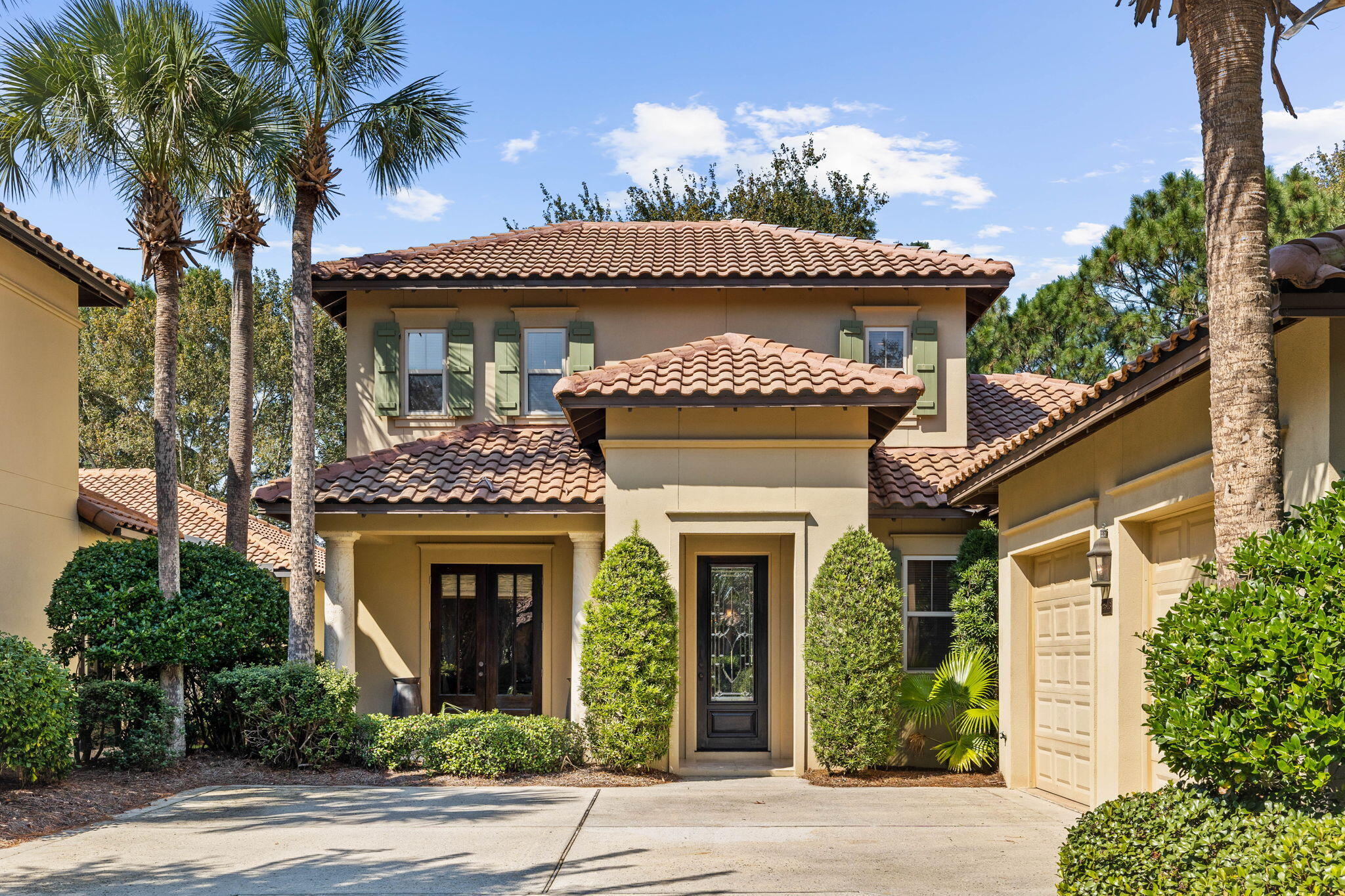 Welcome to this stunning Mediterranean-inspired villa located in the exclusive Vineyards at Sandestin Golf and Beach Resort. This 4-bedroom, 4.5-bathroom residence masterfully combines the timeless elegance of the Italian countryside with the luxury of premier golf course living. Set against the backdrop of three scenic holes and a peaceful lake on the Raven Golf Course, this home offers a seamless blend of sophistication, comfort, and warmth.As you enter, you're welcomed by soaring ceilings, refined crown molding, and exquisite travertine floors that create an atmosphere perfect for both relaxation and entertaining. The chef's kitchen features Verde San Francisco granite countertops, custom cabinetry, and high-end appliances, balancing style and function effortlessly. A versatile guest bedroom or study is conveniently located on the main floor, offering flexibility to suit your lifestyle.

The primary suite is a true retreat, complete with a cozy sitting area that opens to a serene outdoor oasis. Outside, a private patio with a pool and hot tub invites you to unwind while taking in breathtaking views of the golf course. The primary bath features double vanities, a soaking tub, a frameless glass shower, and a spacious walk-in closet.

Upstairs, the open staircase leads to a relaxed family room with rich white oak flooring, ideal for casual gatherings or quiet moments. Two additional bedrooms, each with en suite baths, ensure privacy and comfort for family or guests.

Lush landscaping and captivating golf course views enhance the exterior, while sophisticated interior finishes elevate the living experience. Offered fully furnished with tasteful d??cor, this home is move-in ready, waiting for your personal touch.

Situated within the gates of Sandestin, this villa offers unparalleled access to the resort's premier amenities. Explore miles of pedestrian and golf cart pathways through live oak groves, scenic lagoons, and meticulously manicured fairways. Spanning 2,400 acres from the bay to the beach, Sandestin boasts four championship golf courses, 15 tennis courts, a 226-slip marina, and miles of biking and hiking trails. Indulge in fine dining at celebrity-chef restaurants or enjoy shopping at The Village of Baytowne Wharf, Grand Boulevard, and the Market Shops. A full-service spa and a variety of outdoor activities complete the resort lifestyle.

This is a rare opportunity to own a truly unique property and experience luxury resort living at its finest in The Vineyards at Sandestin.