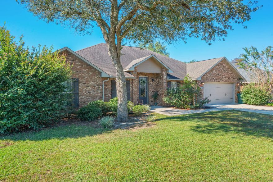 Welcome to this spacious and well-maintained 5-bedroom, 3-bath home located in a desirable gated community in South Crestview. Situated on a large lot, this home offers the perfect blend of comfort, privacy, and functionality--ideal for families and guests alike. Recent updates include beautiful tile and new luxury vinyl plank flooring throughout, adding style and durability to every room. The thoughtful split-bedroom layout features a private master suite on one side, a separate guest bedroom and bath tucked away for added privacy, and additional bedrooms plus a dedicated office space on the other. The large kitchen opens seamlessly to a sunny breakfast area and expansive great room, all overlooking a covered patio and a generous backyard--perfect for entertaining or relaxing. A formal dining room greets you at the entry, enhancing the home's welcoming flow. With a charming front porch and tasteful updates throughout, this home is ready to welcome its next family.

* Stove, refrigerator, dishwasher all less than 2 years old.  LVP also less than 2 years old. Attic stairs have recently been added as well. 