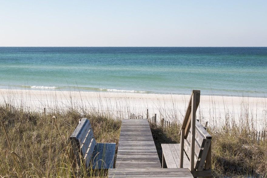 Simply stunning!!...As is the view of the glistening gulf right outside your door! This compactly sized beachfront retreat is all you could ever want, or truthfully, ever need. Newly constructed by the acclaimed builder, Benecki Homes of Atlanta and sumptuously decorated by the talented Melanie Turner Interiors Atlanta, this 800+ square foot cottage might make you fall in love all over again. Approach the entrance via a magnificent view of the sugar white sand and emerald green waters of the gulf and follow the steps up to an expanse of deck that spans the cottage. Enter elegant eight foot French style doors and step into jaw-dropping beauty and sophistication. Try and catch your breath as you take in the numerous, tasteful elements that surround you. Take note of the lovely wire-brushedwashed oak floor; the vaulted, bleached cypress ceiling; and the silky smooth Venetian plaster walls. Along one wall is the kitchen, with it's handsome, weathered grain Leicht cabinetry, which is graced by a gorgeous marble countertop. Cleverly clad to blend into the cabinetry is a full sized Liebherr refrigerator and a compact Bosch dishwasher. A delightfully sized Blue Star dual fuel range completes the top of the line appliances and is topped by a stainless vent hood. The furnishings of the main living area, and throughout the home are so incredibly, beautifully selected. An oval Saarinen dining table is the showplace for an awesome, over-sized arrangement of succulents, and a hefty expanse of rope suspends a chandelier of mammoth jingle shells. A fluffy Tibetan lamb rug anchors the elegantly upholstered linen sofa, woven side chair, and twin slab cross-sections of natural wood coffee tables. Leaving the main room, follow the hallway to the bedroom, and tucked neatly behind Venetian plaster doors is a laundry nook, replete with commercial grade stacked Whirpool washer and dryer and ample storage. Adjacent is an elegant half bath with Restoration Hardware marble topped vanity and a Waterworks faucet. In the master bedroom and bath you find that the superlative finishes and decor continue. The bedroom is a haven of tranquility, perfectly suited for blissful relaxation, and the bath is luxuriously appointed with a Carrara marble herringbone patterned shower, and marble topped RH double vanity with Waterworks faucets. There are generous walk-in closets located off both the master bath and bedroom. Graceful floor to ceiling window coverings are in place throughout the home, and all doors and hardware are quality crafted. There is very little left to want in this spectacular oasis by the sea. Come and discover for yourself how simply stunning your life at the beach might be... Information contained within this listing such as square footage, is deemed to be accurate but is not guaranteed. Buyer to verify