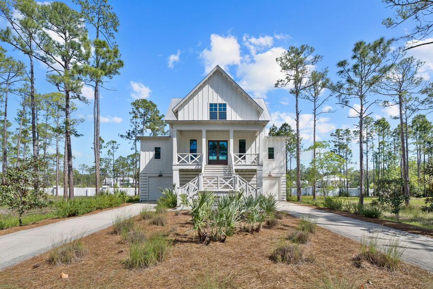 Experience a home that truly embodies all that coastal living really means in this exquisite custom-designed home, just North of Highway 30A. Nestled within the gated, low density community of Cessna Landing, this modern coastal home offers unobstructed water views of the Bay, private community access to the waterfront, complete with a kayak and paddleboard launch, a community pool, and a public boat launch conveniently located across the street. And if you love the sandy beach and turquoise waters of Highway 30A, this home is positioned perfectly to enjoy both - just 3.8 miles directly South and your toes are in the sand! This 4 bedroom, 2.5 bath homes features a stunning entryway and a charming covered porch, perfect for your rocking chairs and watching sunsets. As you walk through the wooden French doors, you're welcomed by 10-foot ceilings, convenient powder room and an open floor plan, perfect for families who enjoy entertaining. The kitchen is fully equipped with Carrara marble countertops, stainless appliances, a Viking gas range, and modern coastal cabinetry. Natural light floods the dining area, creating a warm and inviting atmosphere, while designer lighting enhances the ambiance throughout. The living room offers a picturesque seating area anchored with a cozy shiplap-clad fireplace and is surrounded by full glass doors leading to an expansive southern-style, screened-in porch with breathtaking Bay views. The main-level primary bedroom also has direct access to the screen-in porch and exudes luxury and privacy. This retreat features a large bedroom, walk-in closet, a lavish en-suite bathroom featuring dual vanities with marble countertops, a freestanding tub with a view and a stunning walk-in shower. You will love waking up to Bay views and being only 9 minutes to the sugar white sands each day!

The laundry room is also found on the main level. Adjacent to the laundry room you will find access to the lower level, which accesses the garage are and storage area which is great for kayaks, canoes, beach toys, bikes and so much more. The upper level provides three additional bedrooms with a large full bath providing ample space. One of the bedrooms also features a luxurious, generous-sized, balcony offering sweeping water views. 

Step outside and enjoy a covered patio on the lower level, great for grilling and perfect for additional covered seating overlooking the lush landscaped backyard with cozy firepit. Imagine the memories made here after a day at the community pool or an afternoon fishing off the dock. The lower level can easily be accessed by the screened-in porch making it a great indoor outdoor living experience for all! 

205 Mallard Lane is perfectly positioned to enjoy the lifestyle of a waterfront community while still being within a 9 minute drive to the sandy beaches. The community features underground utilities, natural landscaping for easy maintenance, highly-desirable community pool and dock for water activities. Being in this proximity to Cessna Landing Boat Ramp is also a great amenity for those who wish to fish, boat or enjoy Crab Island year round! This home is a rare find in one of the most sought-after neighborhoods in the area, offering a blend of luxury, convenience, and natural beauty. Don't miss your opportunity to live at the beach, but have the luxury of privacy, serenity and southern charm on 30A!
