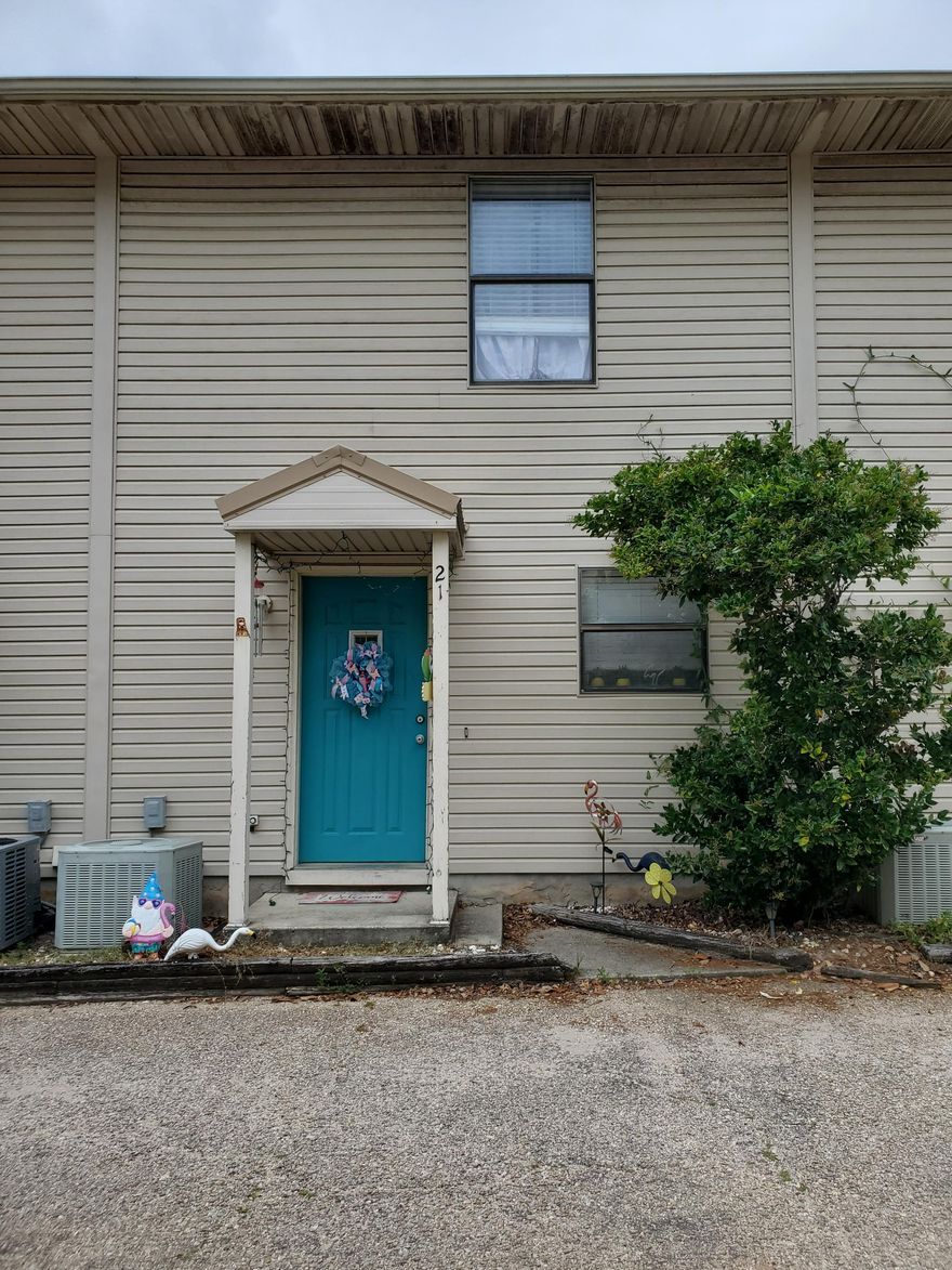 This 2 bedroom, 1.5 bath town home would be the perfect residence or rental investment! The home features a bright open floor plan with kichen, dining, living, and half bath downstairs with sliding doors leading outside and 2 bedrooms with full bath upstairs.  The location is convenient to military bases, schools, shopping, entertainment and the beautiful beaches of Fort Walton or Navarre.  Being sold 'AS IS'. LEASED MONTH TO MONTH.  Buyer is responsible for verifying all square footage measurements and any other information they deem important.