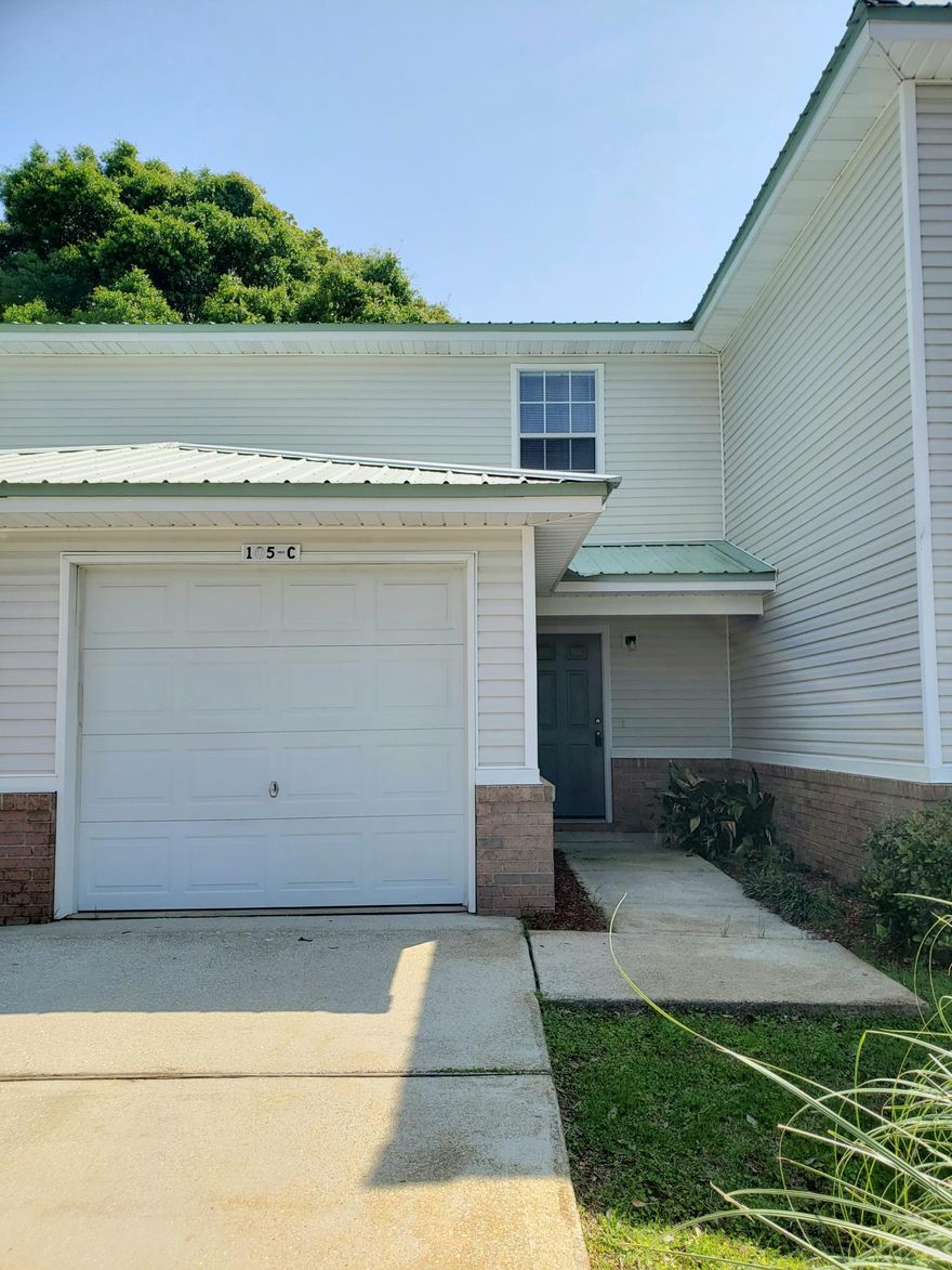 Spacious 2 bedroom townhome with 2 parking spaces. Walk to Downtown FWB! Like new so don't miss out! Open floor plan for dining, living and kitchen areas; breakfast bar; half bath downstairs; all bedrooms on second level; and yard service included! Cat only allowed with non-ref pet fee.