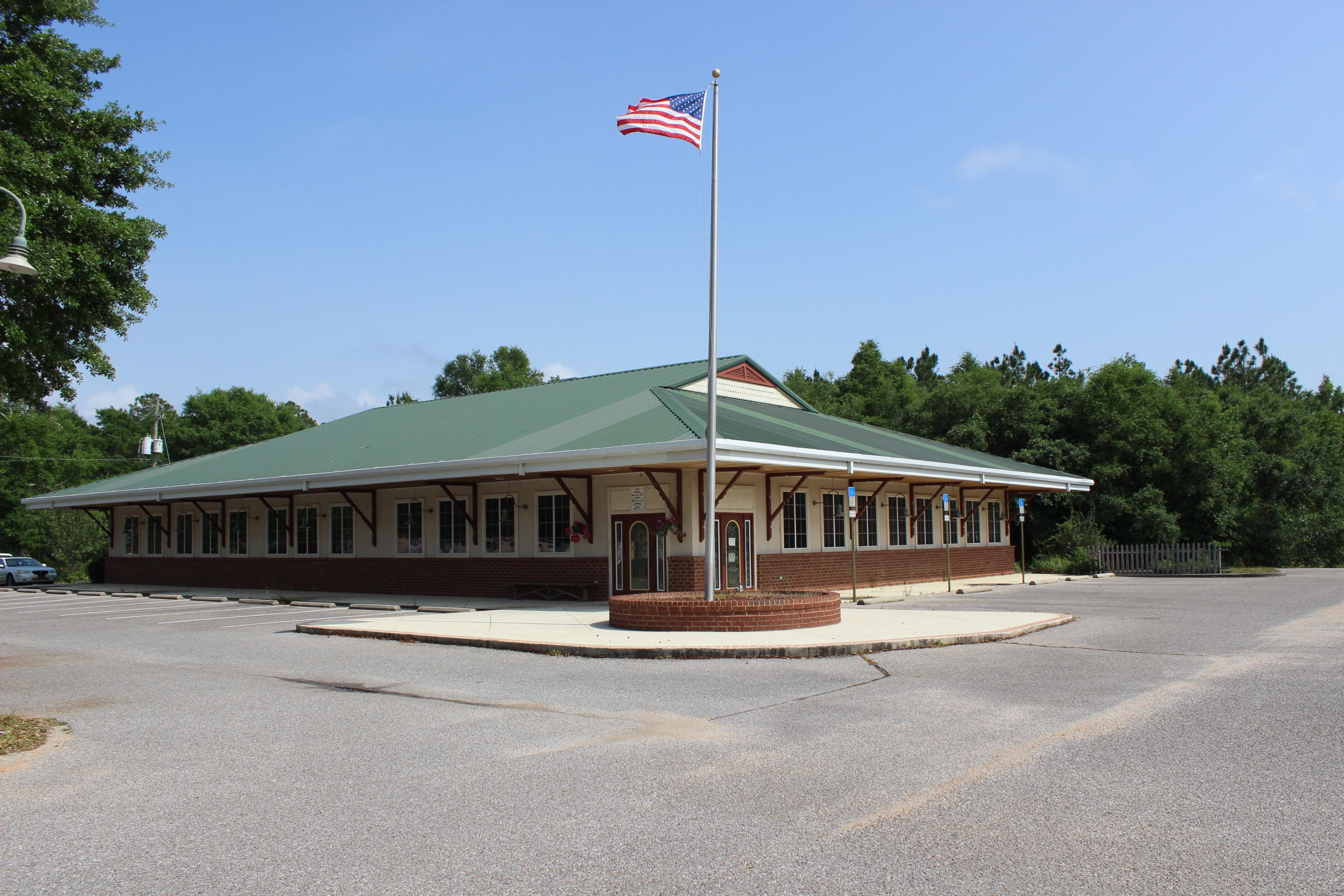 Opportunity for investor or restaurant entrepreneur, this property is priced significantly below appraised value. An appraisal was conducted in 2013 valued at $900,000.00. The building is 6630 square feet, built in 2001, placed on 1.35 acres, located off of new 4 lanes Avalon Blvd with 198 feet road frontage. The average daily traffic count according to the FDOT is 20500 a day for 2016. The property is being sold as is with the kitchen equipment, walk in cooler, freezer, 3 hood system, 4 fryers, gas grill, microwave, 5 flat top, Bill Thompson office equipment, pos systems, 3 printer, two work stations, furniture and much more. The building is permitted to seat 200 people with plenty of paved parking. This property is zoned HCD and could be utilized for many different businesses.