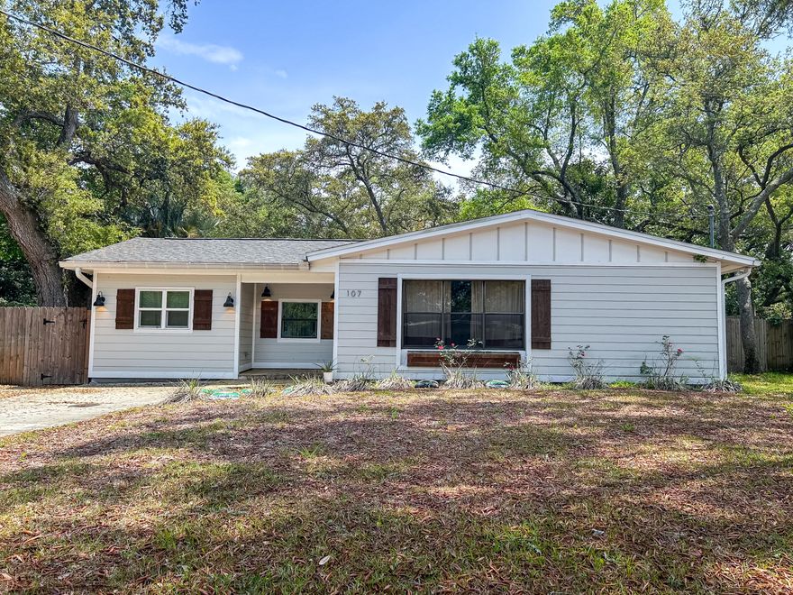 Bright, fresh, and full of charm, this home feels new but still holds onto that dreamy mid-century beach vibe. Inside you'll find durable driftwood-style flooring, a gorgeous modern kitchen with granite counters, shaker-style cabinets, stainless steel appliances, and a farmhouse sink you'll actually look forward to using.Both bathrooms are completely updated with timeless finishes.Out back you'll find a private, park-like setting perfect for relaxing or entertaining - mature trees, lush lawn, and just the right amount of shade. There's also a sturdy metal shed for storage and convenient side parking for your beach gear, bikes, and more. Enjoy unbeatable convenience with Ferry Park just across the street, quick access to boat launches, and all the shopping and dining options at Uptown Station just minutes away!
