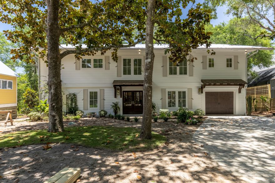 This beautiful 6 bedroom/4.5 bath home sits towards the back of a deep lot on 85 feet frontage of the canal, 1/3 of an acre and all new landscaping.   You can have the feeling of living on a peaceful street, tucked away among the trees in Old Seagrove and still have a quick walk to Seaside and the public beach access.  Turnkey, all brand new and new furnishings, located just 4 blocks from Seaside and the public beach access at the end of 395. Architectural designed by Greg Jazayeri Design. (continued)....