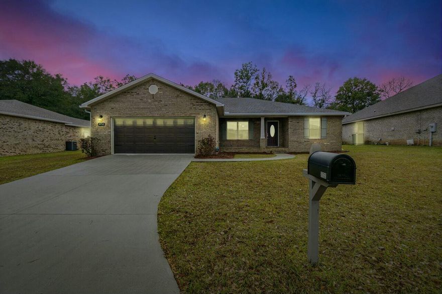 This meticulously maintained, one-owner home outside of the expensive City of Crestview taxes, offers a modern design with a custom-built feel. Featuring a thoughtfully crafted 3-bedroom, 2-bath split-bedroom layout, this brick contemporary home boasts stylish details from the moment you arrive, starting with the charming front porch finishes. Inside, tray ceilings, crown molding, and recessed lighting enhance the elegant ambiance.  The open-concept living area is complemented by a spacious kitchen with an oversized island--perfect for entertaining. Upgraded cabinetry, granite countertops, a stainless steel undermount sink, and stainless steel appliances--including an electric range, microwave, and dishwasher--add both functionality and style.  Click here for more... Granite countertops extend into the master bath, guest bath, and laundry room. The master suite features a tiled tub surround and a custom tile shower. Additional highlights include upgraded ceiling fans, French doors with interior blinds leading to the backyard, and shiplap accent walls added by the sellers.  

The fully fenced backyard provides a private retreat and plenty of space for whatever your heart desires. Foam insulation over the living areas ensures energy efficiency (ask about the avg utility bill) the HVAC system has been professionally serviced every six months, and recent upgrades include gutters and a security system. The neighborhood is dream with all close knit residents of this tucked away cul-de-sac. This home gives you the feeling of being away from the hustle and bustle but close enough for daily chores. 5.4 miles to Winn-Dixie and Publix shopping centers with restaurants and shopping. 6.3 miles to Crestview High School. 