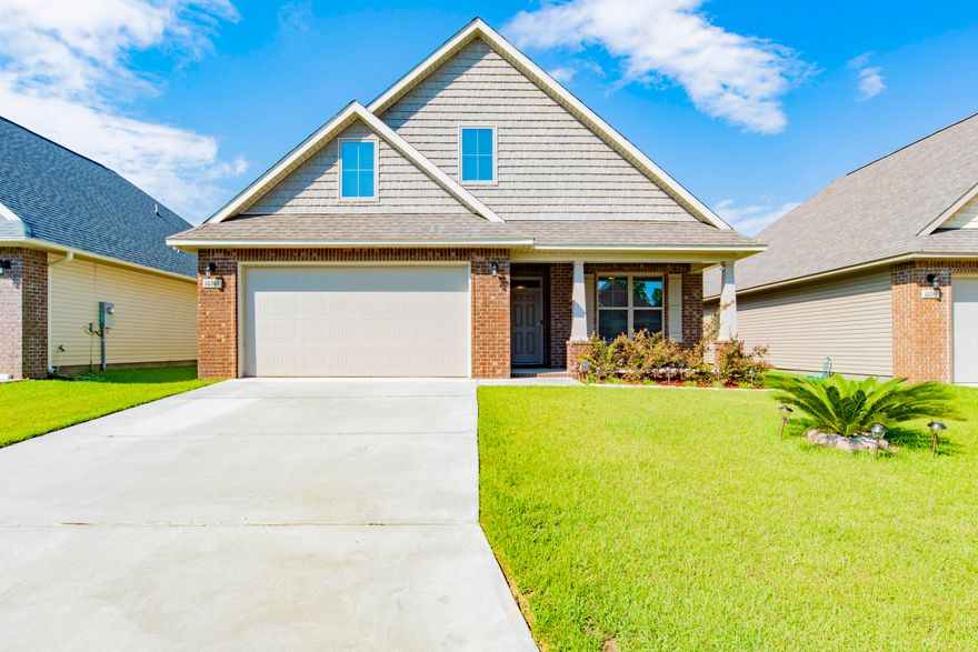 Nestled in the community of Millview Estates and built in 2018, this well maintained 4 bedroom and 3 full bathroom home has so many wonderful features! You'll enjoy the spacious open floor plan with the master suite on the first floor for your convenience. The gorgeous kitchen comes equipped with stainless steel appliances, soft close cabinetry, electric cooktop with a built-in microwave, granite countertops with a breakfast bar on the island and an oversized walk-in pantry. Just off the kitchen you'll find the master suite with a large master bathroom that features a double vanity, walk-in shower, garden tub, linen closet and large walk-in closet. You'll also find an additional closet in the master bedroom providing additional storage. The spacious living room has an electric fireplace an d tray ceilings with sliding glass doors opening to the covered patio measuring 18'x8'. Also located on the main floor is a sizable laundry room and an additional bedroom and full bathroom. This would make for a great space for an in-law needing to be on the main floor, nursery or a home office. Upstairs, you will find 2 additional bedrooms and a full bathroom with a walk-in shower. Other notables are hurricane coverings, fully fenced back yard with a privacy fence, Vivant video home security system, walk-in attic storage space, no HOA and covered front porch. Located just 15 minutes to NAS and 15 minutes to the beautiful beach on Perdido Key! Check out our full video tour ion the MLS and YouTube!