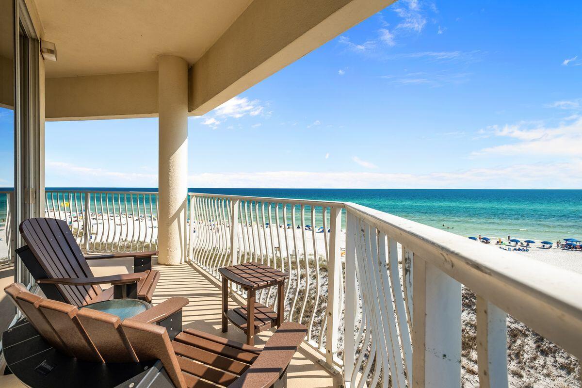 Tucked away south of 30A in desirable Seagrove Beach, this rare three bedroom gulf-front condo offers sweeping gulf views from every angle and just under 1,900 square feet of living space. Perched on the top floor of Dunes of Seagrove, this one-of-a-kind retreat boasts gulf views and balcony access from all three bedrooms. The expansive balcony wraps around the entire condo and is perfect for entertaining and taking in views of the Emerald Coast. Upon entering the foyer, you are almost instantly greeted with views from both the kitchen and living area. The fully equipped kitchen features granite countertops and stainless steel appliances. Eastern views can be enjoyed from the spacious master suite, which flows seamlessly to the ensuite with double vanities, a whirlpool tub and separate