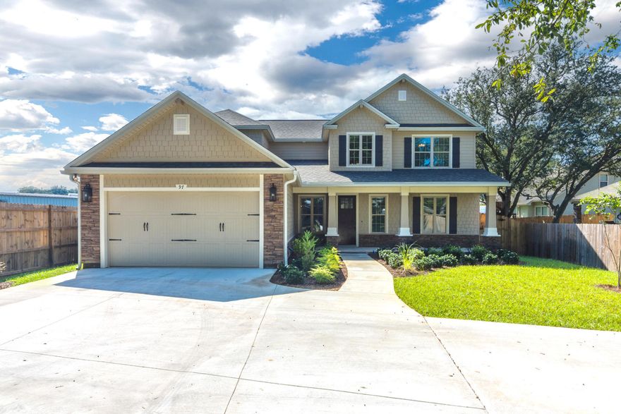 RARE opportunity to own this 1.5 year old, 5 bed, 3 1/2 bath, spacious and beautiful craftsman/cottage style home in the heart of Fort Walton Beach. Enter the open plan, first floor through the two story foyer that leads to the airy living room with a bricked gas fireplace or craftsman kitchen complete with stainless appliances, granite countertops and breakfast area. The master bedroom is also on the first floor with dbl vanity, garden tub, walk in closet and separate shower. Going upstairs from the entry overlooks the living room. There are split 4 bedrooms and 2 full baths upstairs. Wood flooring throughout other than tile wet rooms and carpeted upstairs bedrooms. Attic over garage. Tankless gas water heater! The circle driveway is great for excess vehicles and get togethers. The back yard has the perfect set up for your future pool.  Motivated sellers. Make an appointment to view before it's too late!