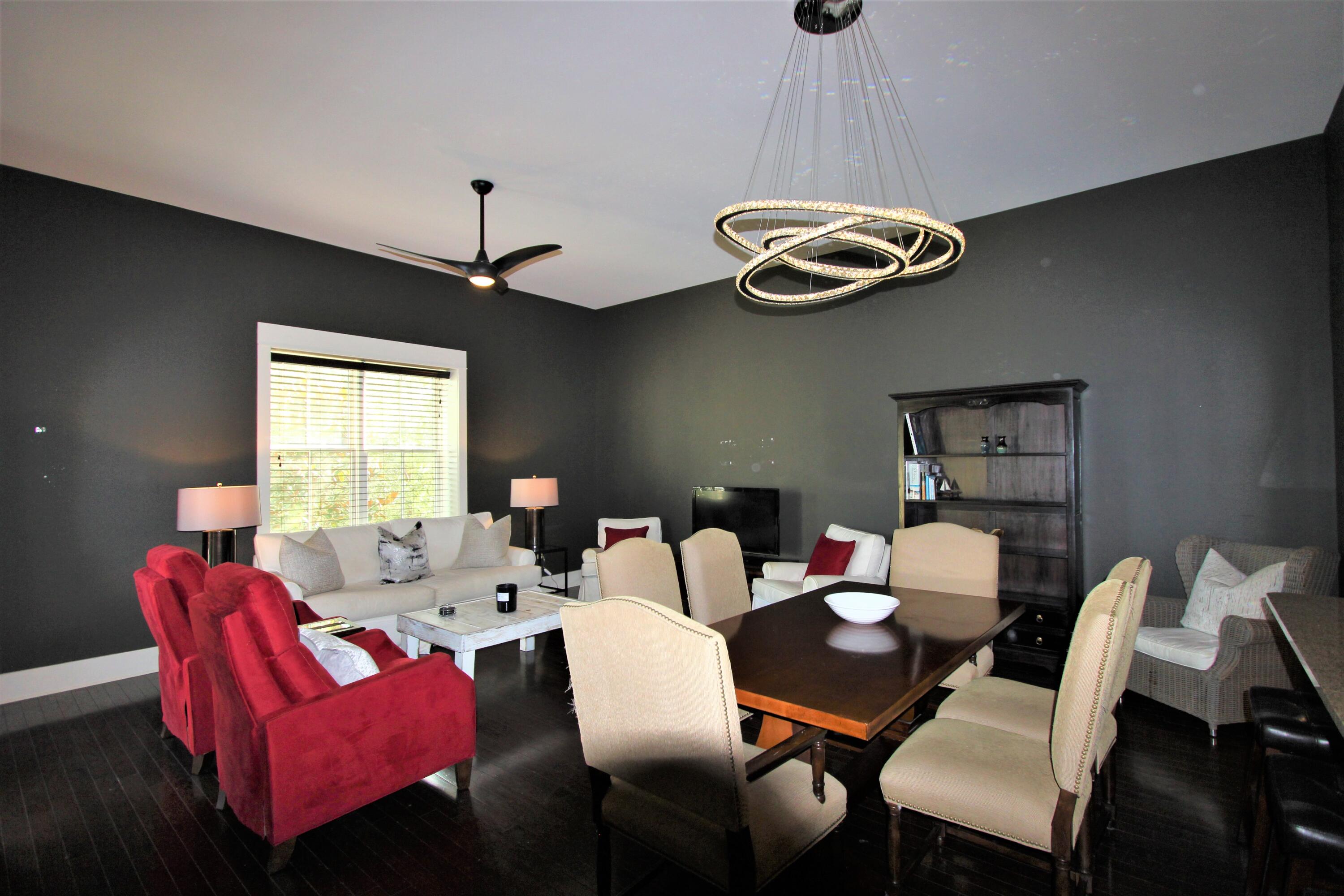 Condo overlooks Big Redfish Lake, a protected coastal dune lake, from your secluded corner covered balcony at Redfish Village. Condo is an end condo offered furnished, features include tasteful wood cabinetry, granite counter-tops, wood floors, stainless steel appliances with wine refrigerator, oversized master shower, custom owners closet and built-in screens on the Master and the Living room porch doors. Property offers private deeded beach access to the white sand beaches of the Gulf of Mexico with private bathrooms & outdoor showers that are accessible by the Redfish Private Beach Tram, a short stroll or bike ride.