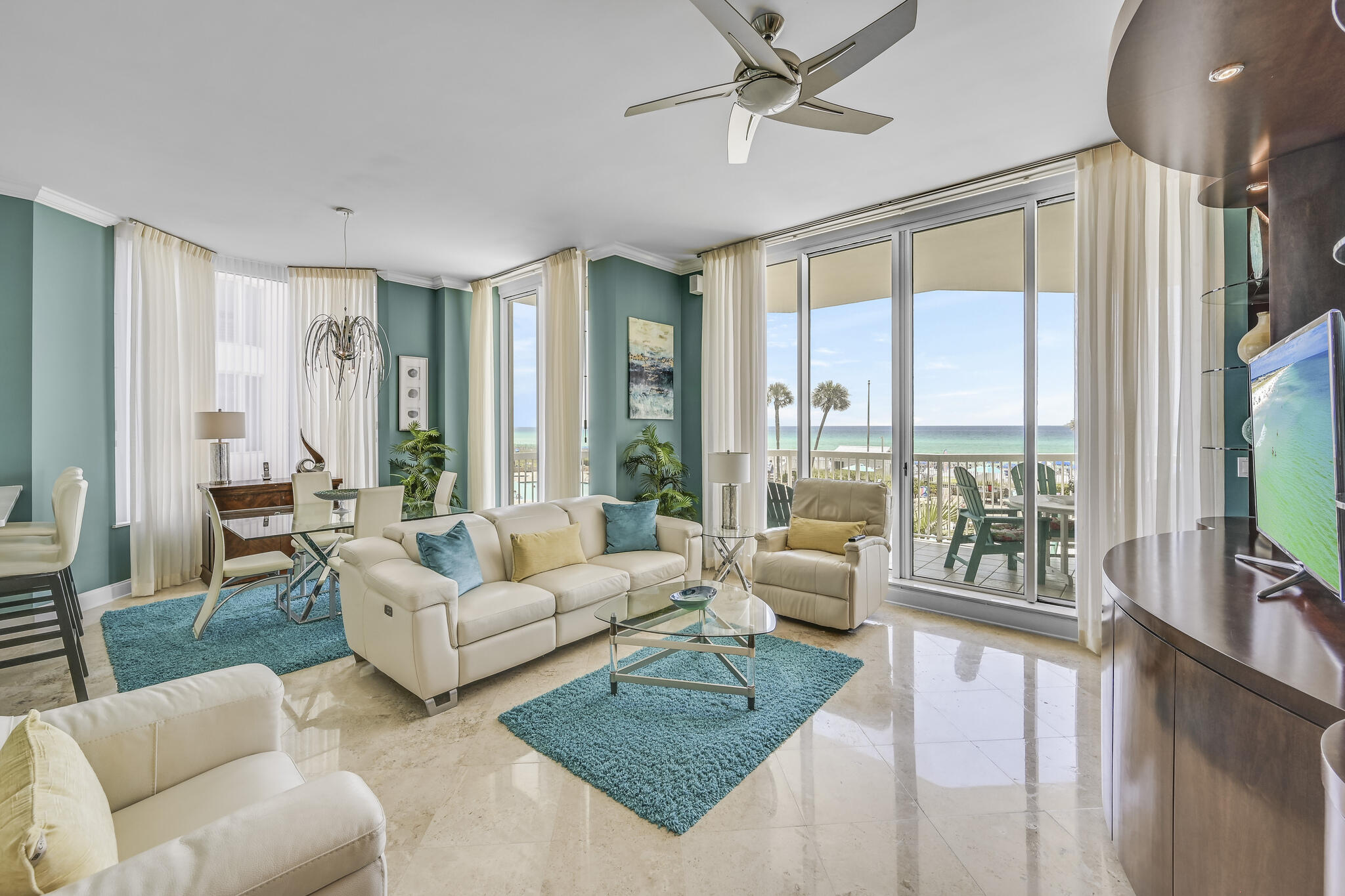 unique opportunity to own an exquisitely furnished and never rented Second Floor 3 Bedroom, 3 Bath Gulf Front Condominium. this residence boasts 10 ft ceilings and 9 Ft sliding doors leading to your private Balcony overlooking the Emerald Green Waters of the gulf of Mexico, sugary white sand beaches, Swimming pools, waterfalls and Hot Tubs. imagine waking up in your gulf front master bedroom and listening to the waves gently lapping the shoreline while you watch the dolphins playing in the surf. grab a morning cup of coffee and enjoy the sights and sounds while sitting on your private balcony or sit on the custom Italian leather couches and chairs in your great room. this beautiful and unique home has designer