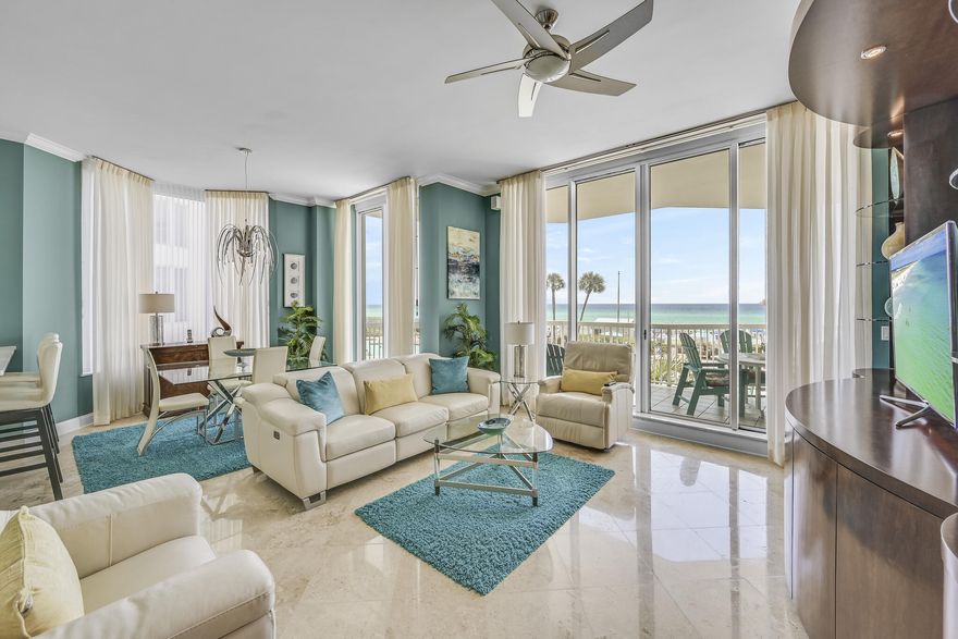 unique opportunity to own an exquisitely furnished and never rented Second Floor 3 Bedroom, 3 Bath Gulf Front Condominium.  this residence boasts 10 ft ceilings and 9 Ft sliding doors leading to your private Balcony overlooking the Emerald Green Waters of the gulf of Mexico, sugary white sand beaches, Swimming pools, waterfalls and Hot Tubs.  imagine waking up in your gulf front master bedroom and listening to the waves gently lapping the shoreline while you watch the dolphins playing in the surf. grab a morning cup of coffee and enjoy the sights and sounds while sitting on your private balcony or sit on the custom Italian leather couches and chairs in your great room. this beautiful and unique home has designer