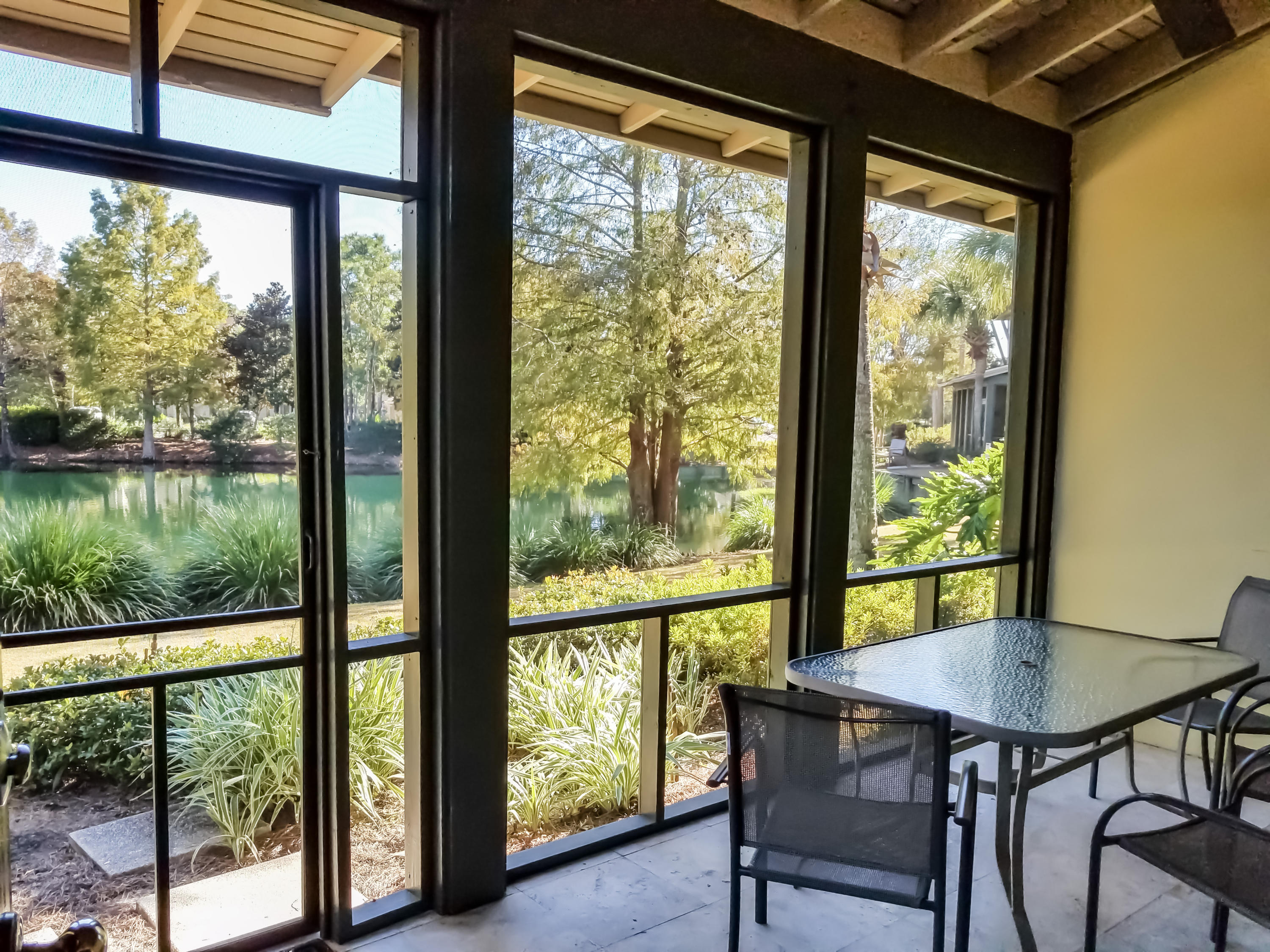 Enjoy relaxing on the newly screened porch of this luxurious lake front townhome in the heart of Sandestin Golf and Beach Resort. A-rated on Sandestin Rental! This Magnolia Bay townhome boasts beautiful furnishings, flat screen televisions, limestone flooring, plantation shutters, an attached garage, solid Corian counter tops and stainless steel appliances in the kitchen. The living room, dining, and kitchen are all open and spacious with mahogany French doors leading to the screened porch overlooking the lake. The large master suite features lake views and a double vanity, Jacuzzi tub, and a separate shower in the en-suite bath. This resort home is centrally located near the community pool, the Sandestin Tennis Courts, Marina, Jolee Island and the Village of Baytowne Wharf.