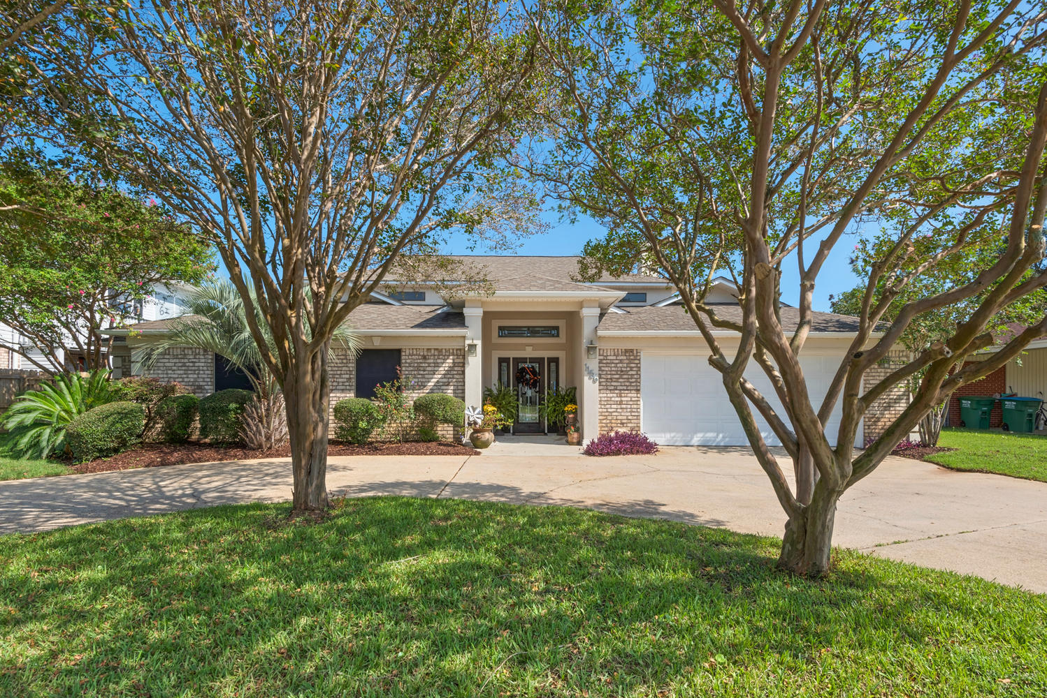 CUSTOM GULF BREEZE CANAL HOME WITH HIGHLY SOUGHT AFTER DEEP WATER ACCESS AND DOUBLE ALUMINUM BOAT LIFTS! THE ENTIRE LIVING AREA HAS BEEN FRESHLY PAINED WITH A LIGHT CREAMY NEUTRAL AND IS MOVE IN READY! THIS HOME NOW HAS TWO MASTER SUITES, 3 BEDROOMS AND A PRIVATE DEN. NO UPGRADE HAS BEEN OVERLOOKED WHEN CONSIDERING STYLE AND FUNCTION. FAVORITE UPGRADES INCLUDED ARE: CUSTOM SAUNA IN DOWNSTAIRS MASTER BEDROOM, IN GROUND POOL WITH BRAND NEW LINER, HIDDEN LAUNDRY CHUTE, COVERED OUTDOOR KITCHEN AND SO MUCH MORE. THIS HOME IS WELL MAINTAINED AND THE SELLER HAS RE-SODDED THE ENTIRE YARD, INSTALLED A NEW A/C SYSTEM AS WELL AS A NEW WATER HEATER. HOUSE DID NOT FLOOD IN HURRICANE IVAN.