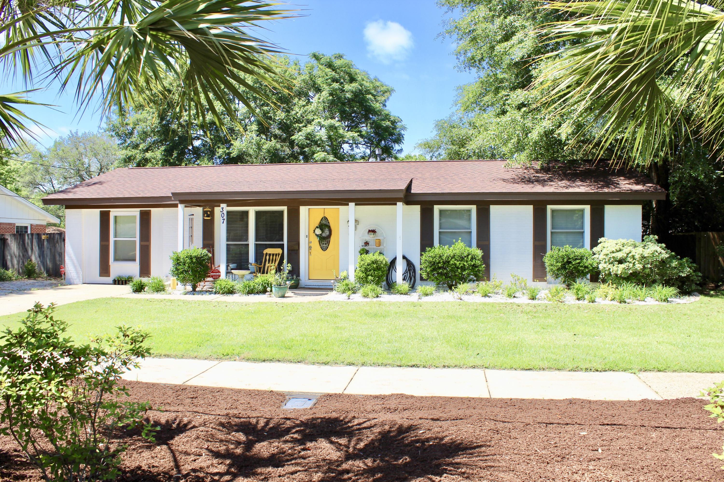 Check out this beautiful home in the heart of Niceville. This three bedroom two bath home offers gorgeous hard flooring throughout the home. The blue cabinets and backsplash together along with the granite counter tops in kitchen gives this kitchen the splash of color that it needs to set it apart. With all the upgrades this home is ready for its next owner to call it home. Call you agent and get your tour scheduled before it is gone. Roof is a 2017