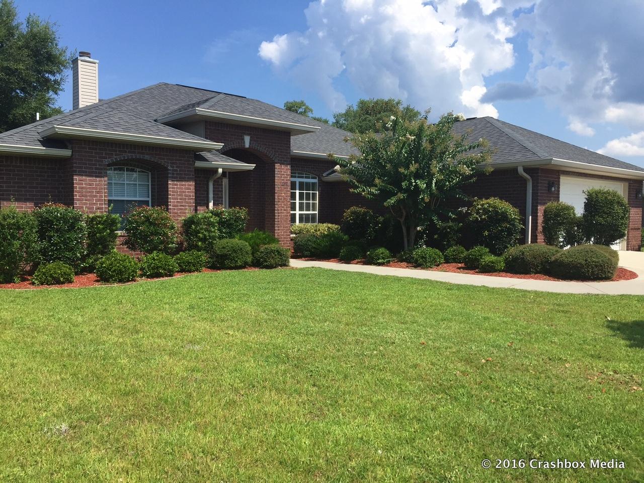Contemporary, immaculate, and move-in ready, this spacious all brick home has a lot to offer. It is located on a large .3 acre lot in Harvell's Crossing, a small community of estate homes right off 399 which boasts a brick wall across the entire front of the neighborhood, sidewalks, underground utilities, street lights, and less traffic congestion than many neighborhoods in the area. Features include high ceilings, a fireplace and built-in cabinetry in the living room, dark wood cabinetry, a breakfast bar, and stainless steel appliances. The master suite has a bay window and coffered ceilings as well as a large bathroom featuring a separate shower, garden tub, walk-in closet, and double vanities. The location is fantastic, just off Highway 399.