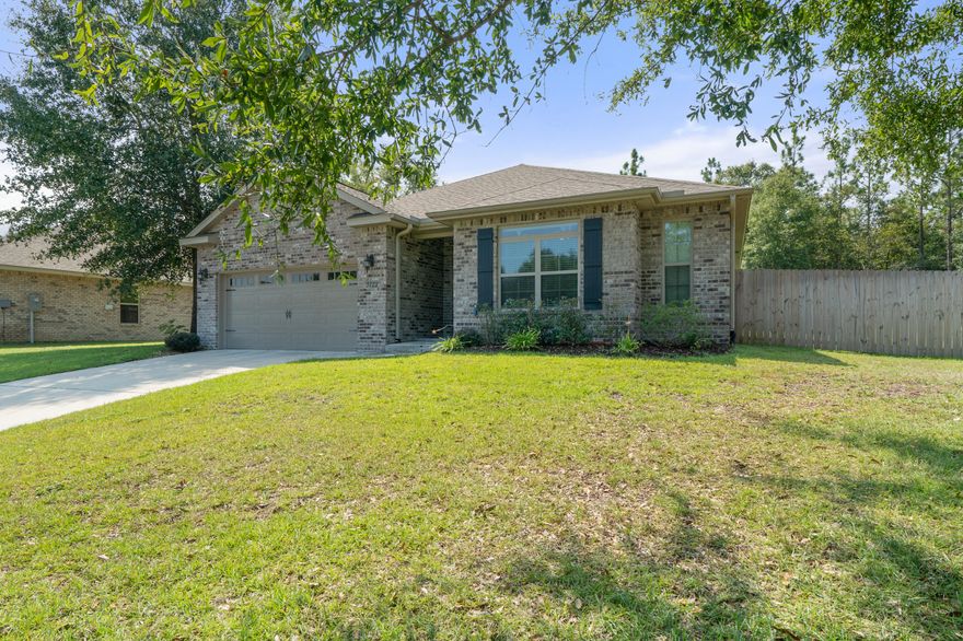 All brick home built by award winning Watree Construction. Great Room, kitchen and dining area are bathed in light from the open floor plan. The kitchen has gorgeous cabinets, stainless steel appliances, granite counters and a good sized pantry. This open design welcomes anyone in the kitchen into the conversations in the Great Room as well. Featuring split bedrooms in this very functional plan with the Master suite to the rear of the home with trey ceiling. The master bathroom features a large walk in closet, double vanities, soaking tub and separate shower. All bedrooms have ceiling fans as well as the Great Room. The back yard is quite large and fully privacy fenced providing a wonderful play area for all. The entire property has an irrigation system as well. Schedule your tour today!!