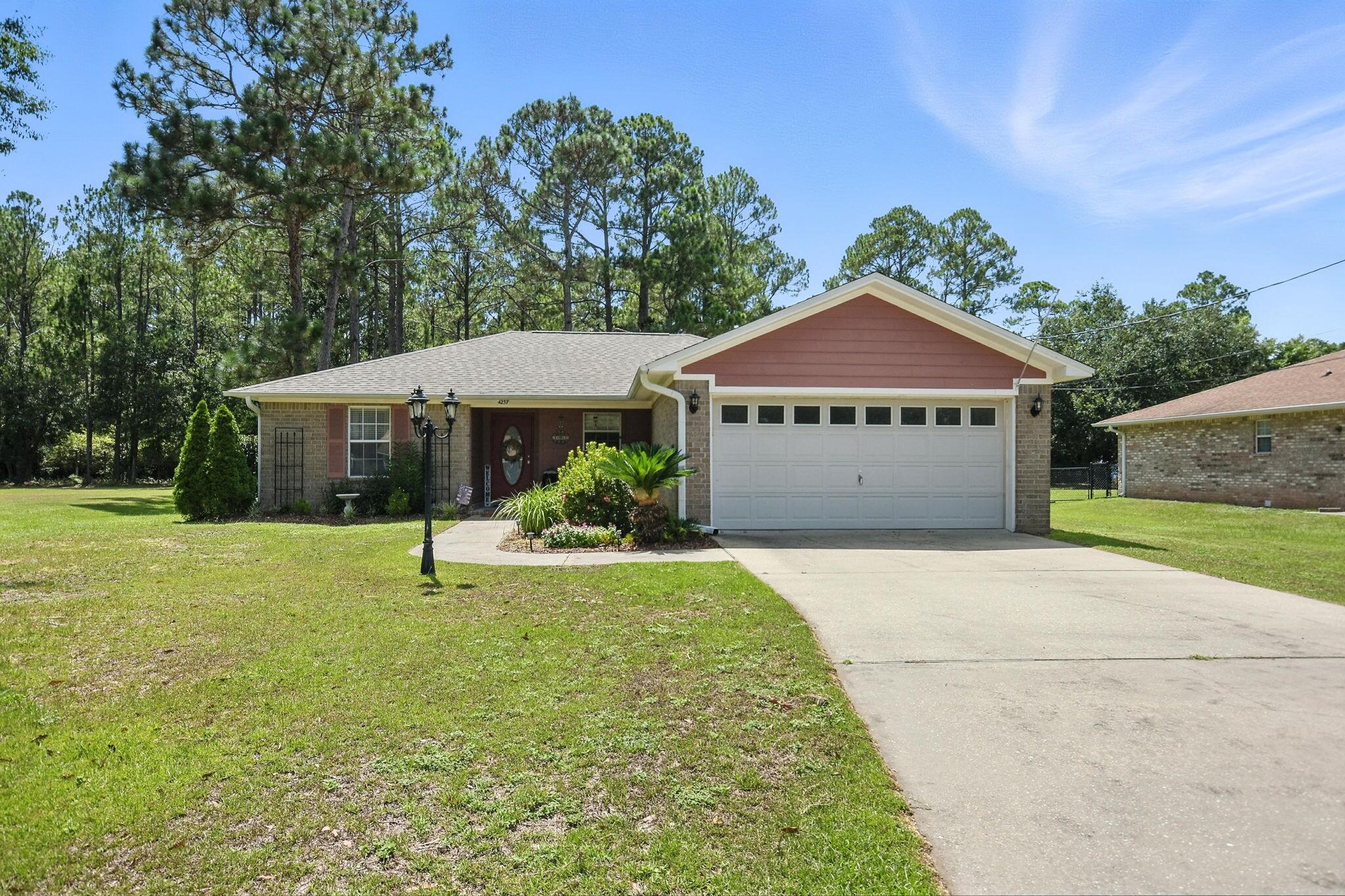 Discover this delightful 3-bedroom, 2-bathroom home at 4237 Melton Rd, Milton, FL, offering 1,284 sq ft of cozy living space. Perfect for families or hobbyists, this property features an above-ground pool, a shed, a chicken coop, and a spacious enclosed back porch for year-round enjoyment. Nestled in a serene neighborhood, it's just 10 minutes from NAS Whiting Field and 25 minutes from NAS Pensacola, ideal for military families. Enjoy nearby attractions like Blackwater River State Park and the vibrant downtown Milton, with easy access to shopping, dining, and Pensacola's beautiful beaches. Move-in ready and packed with charm--don't miss out!
