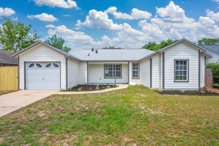 Welcome to this beautifully remodeled 3-bedroom, 2-bathroom home, thoughtfully updated in 2023 to include all new paint, flooring, and updated quartz counters in the kitchen and new shaker white cabinets. The home also includes a new roof (2023), water heater (2023), and new HVAC system (2023).
