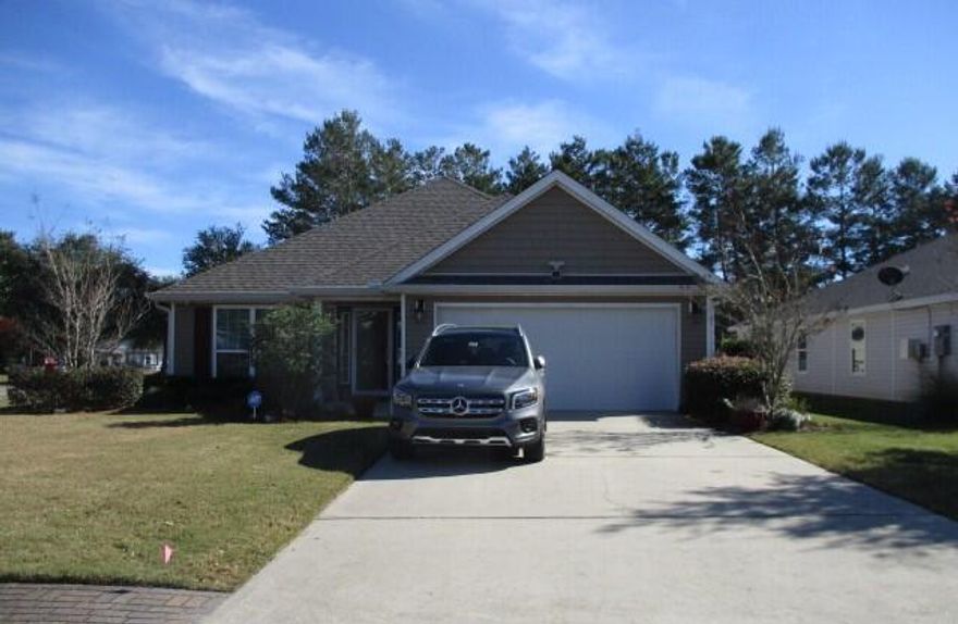 This home has it all! Fenced in back yard complete with pergola, stone firepit & outside furniture. The Pergola has lights, a bar& bar stools for your entertaining. Screened porch off the Livingroom comes with clear vinyl weather shades.  HOA covers water sprinkler system & all landscape both front & back.  Inside you have a large kitchen , glass backsplash & kitchen island. A Very open and enviting floor plan with lots of space for all your needs. The master bath features a tiled walk in shower &  bidet  This home sits on a corner lot and is in one of the best locations for easy access to all Hammock Bay's amenities which are just a few steps from the back yard. You can see the tennis courts while sipping your beverage under the pergola. You wont want to miss this Gem!