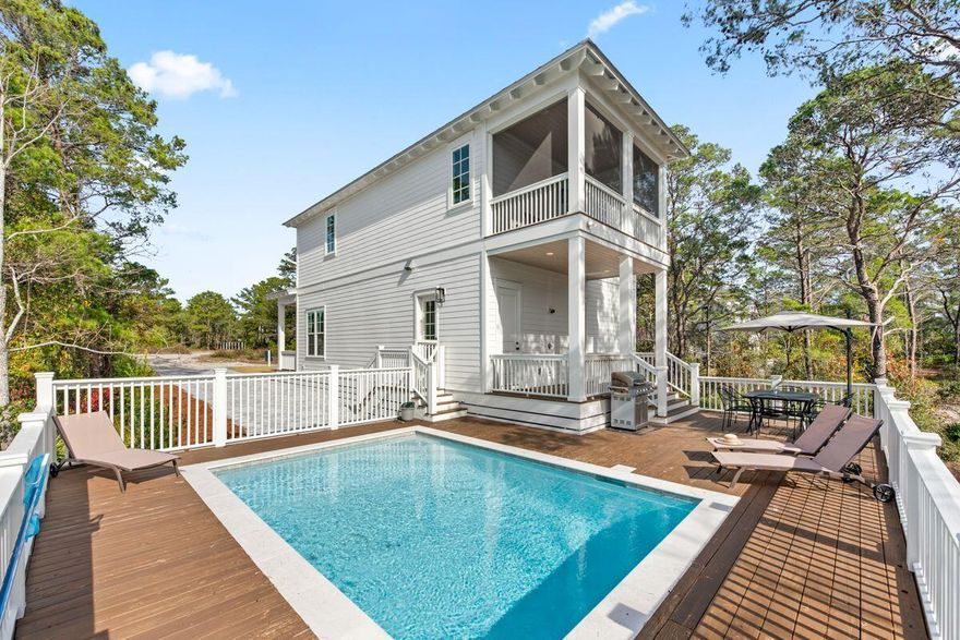 This 30A home offers impressive rental income and low cost of ownership with NO HOA, a private pool, parking for up to 6 cars, 4 bedrooms plus a bunk space, and steps local restaurants and THE BEACH!  You'll be impressed with the quality of construction and ideal layout which offers one bedroom and bath on the first floor, primary suite on the second level along with 2 rooms that share a bathroom.  The bunk space creates the perfect space for rental income, however, if looking for a primary home it could offer a second living space.  CALL AN AGENT TO SCHEDULE YOUR SHOWING TODAY!!!  kitchen where culinary enthusiasts will revel in the brushed stainless steel appliances, custom white cabinets and abundant storage. Three chrome light fixtures highlight the generously sized island, offering further space for dining and socializing. The main floor also includes a bedroom with an ensuite bath, a powder room and a laundry, adding to the practical layout of the home. Three well-proportioned bedrooms occupy the second floor along with a flex space currently used as a bunk room to sleep four. The king-sized master suite creates a sanctuary of calm with its own screened porch overlooking the heated private pool and mature vegetation. The luxurious master bathroom boasts a contemporary soaker tub, double vanity and walk-in shower. The outdoor area continues to impress, from multiple porches to the spacious sunny pool deck which is perfect for poolside barbecues. The lengthy private driveway offers ample parking space for up to six vehicles. Shopping, dining and galleries are just two minutes away at Gulf Place along with an outdoor amphitheater that regularly hosts concerts, art shows and events. Ocean Reef currently manages the home- to see future bookings: https://www.oceanreefresorts.com/vacation-rentals/seas-the-day/
