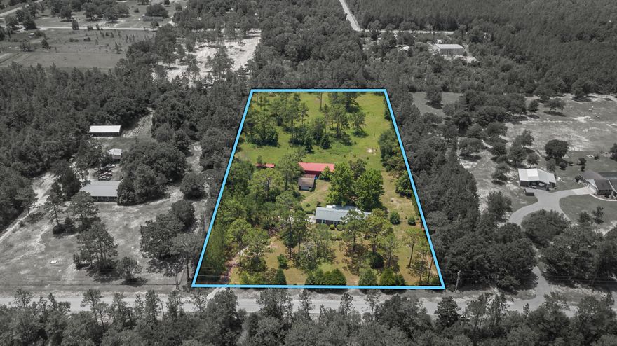 Calling all horse lovers and those looking for the country get away without sacrificing easy commute to the local bases, beaches, and shopping centers. Beautiful 3 bedroom 2 bath home on 5 acres with a 25x60 enclosed shop/rv storage and another 20x24 workshop. Property is crossed fenced with a pasture in the back ready for your horses. There is a large 12x40 back deck to enjoy your morning view with a hot cup of coffee. Now step into your new home and take note of the formal living room, formal dining room, family room, fully equipped kitchen, and breakfast area. Master bedroom has a walk-in-closet, and Master Bath has access to the Screened Porch. Additional bedrooms have oversized closets. Roof was replaced in 2015. HVAC replaced in 2018. Schedule your showing today!!!