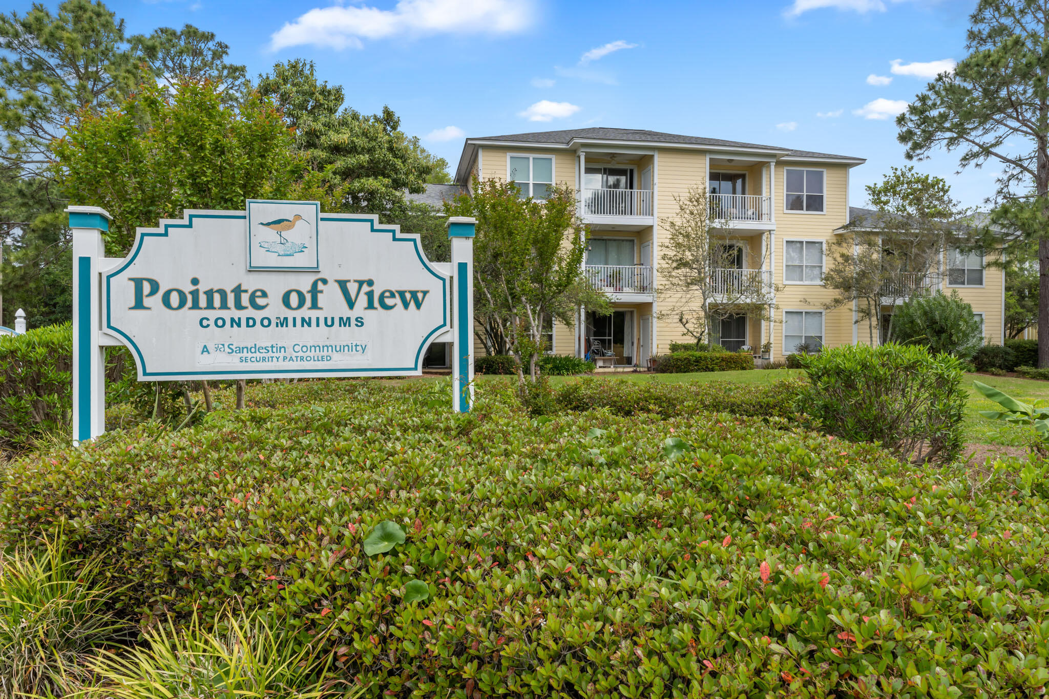 Beautiful 2 bed, 2bath corner unit with a covered back porch overlooking the woods with no neighbors above you. This well-kept condo is just a few minutes from Grande Boulevard, Publix, Sacred Heart Hospital, and the beach. The HOA offers a community pool, pool house, and fitness room.