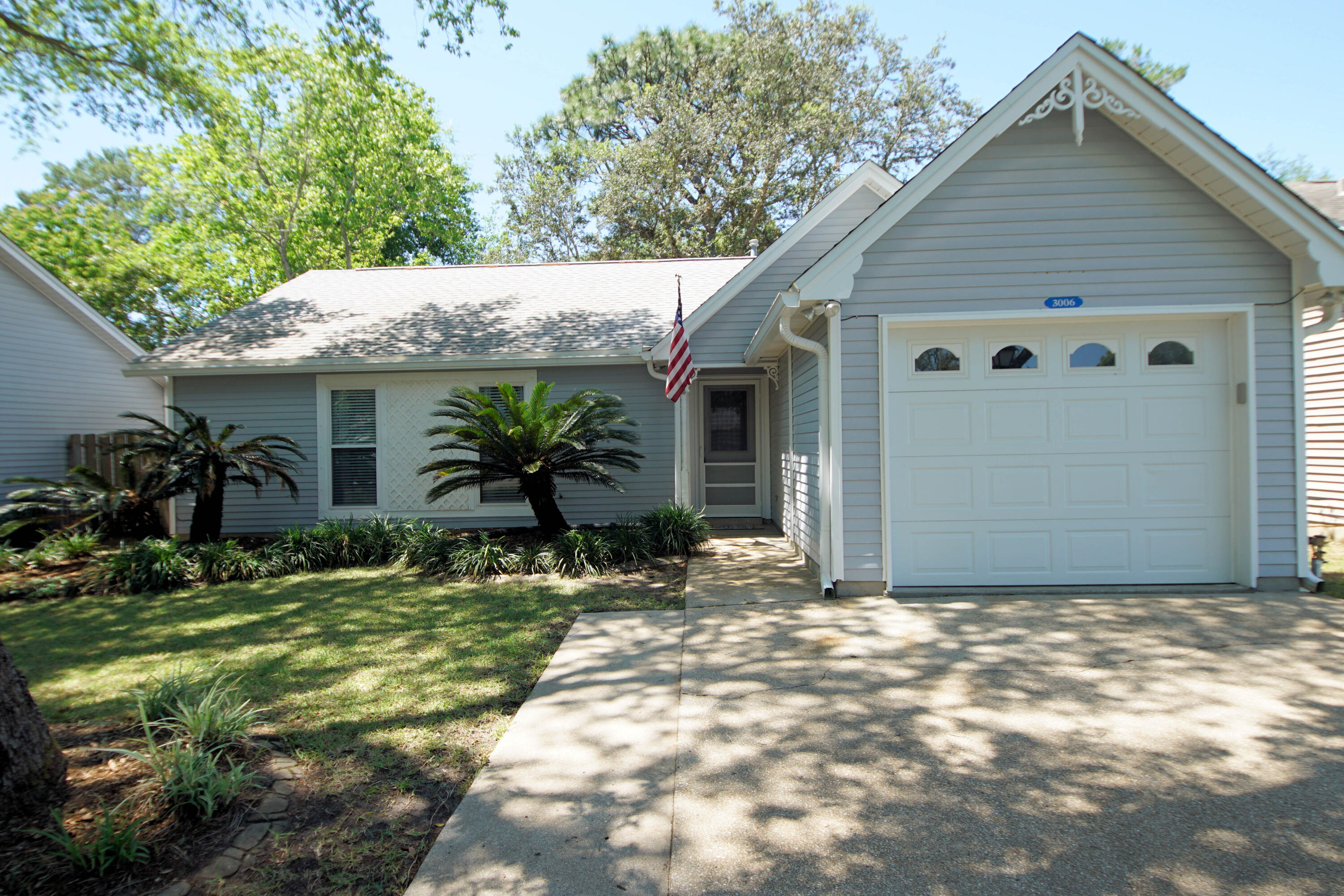 Welcome home to this adorable 3 bed, 2 bath home conveniently located in Blue Pine Village with a community pool and super low HOA dues.  Proximity to Bluewater Elementary School, shopping, restaurants, breweries, beaches, EOD school, Eglin Air Force Base, and Duke Field.  Low maintenance vinyl siding home with a new roof in Nov. 2021, new gas water heater in 2019, A/C has been serviced, and new gutters in 2019. Landscaping has been freshened up, the sprinkler system has been updated and the home has been pressure washed. The exterior features a new doorbell, flood lights on the front and back of the home.  No popcorn ceilings! Home features a cathedral ceiling in the living room, bay-type window in dining room, loaded with lots of natural light and an open patio just of the living room.