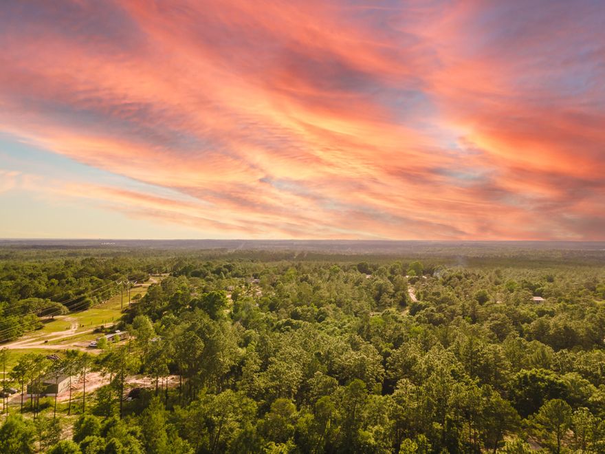 Welcome to the country! This wooded property is ready for the person who has a vision to make this a country homesite, RV park, or whatever else you can think of. Only a 10 minute drive to the downtown Crestview area. RV's, mobile homes, farm animals and horses are allowed. The possibilities are endless and there is no HOA.