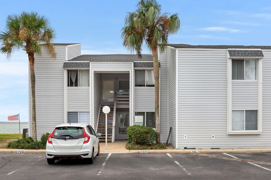 Are you looking for your own slice of paradise? You can sit on your patio watching fireworks from the Destin Harbor. Water views from this ground floor unit which has open concept living room & kitchen. This super cute, updated condo has all the amenities you could ever ask for. Including swimming pool, sauna, pet friendly. Step right outside your door and you are just steps from the water.  No short-term rentals. Special assessment has been paid by owner. Exterior of building has brand new vinyl and new roof.