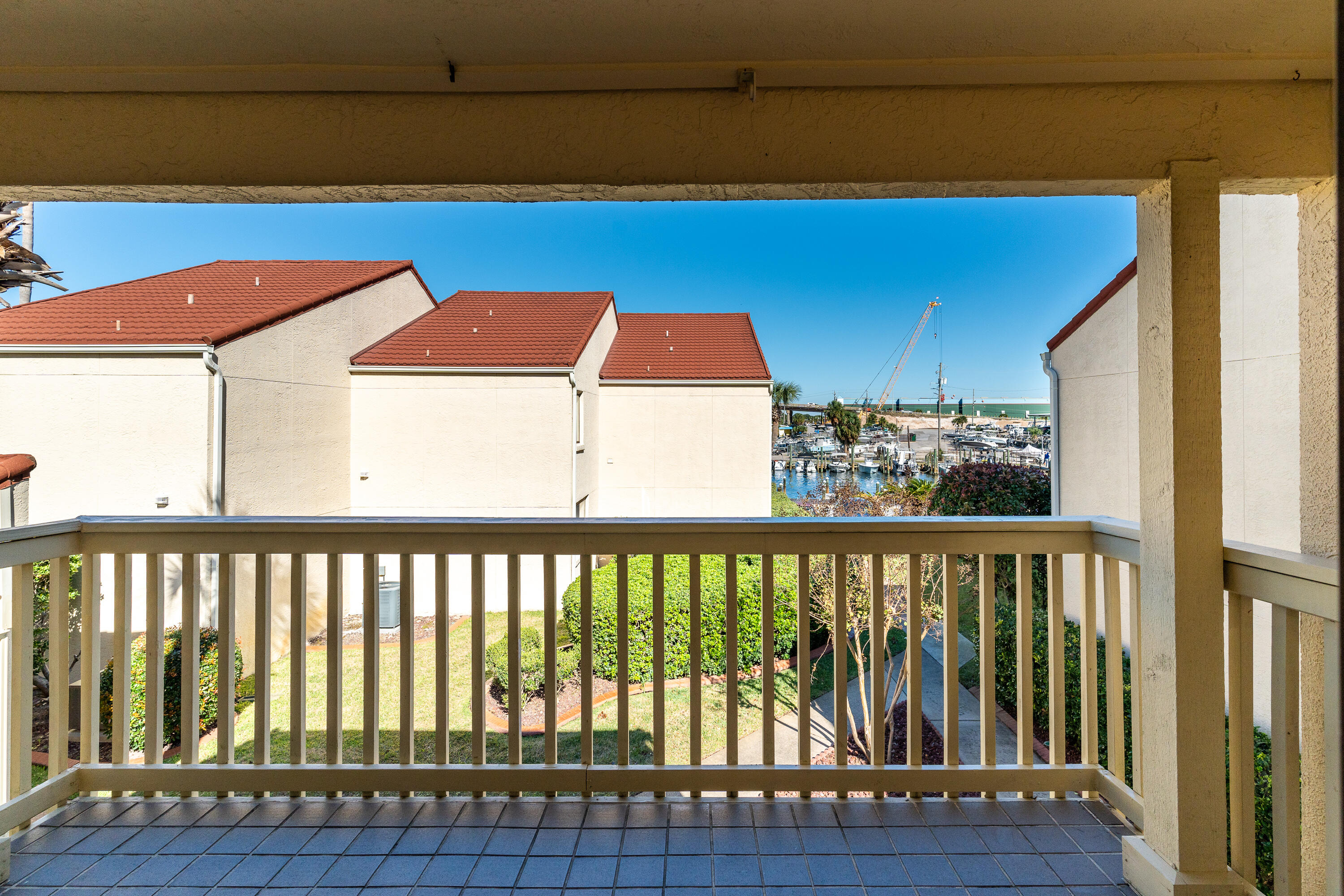 Waterviews from balcony and bedroom SELLER IS MOTIVATED! YOUR BOAT SLIP AWAITS! #11 (12x30) INCLUDED! STOP RENTING. START LIVING THE WATERFRONT DREAM! Repainted interior walls and downstairs ceiling makes this a showstopper. We're not talking about a 'little renovation.' We're talking a total transformation structural fortitude: Reinforced floor joists? We've got them. This place is built to last . Modern powerhouse Brand-new electricals, PEX plumbing, and climate control that'll make your neighbors jealous. Gourmet Beauty: A kitchen that'll ignite your inner chef with sleek cabinetry, stainless steel, and a farmhouse sink that screams luxury. Smart home ready: Pre-wired for a 5.2 surround sound system? Yes, we've got that IMPACT RESISTANCE: High-impact doors and windows + hurricane shutters = ultimate peace of mind. PRIVATE BOAT SLIP #11 (12x30) included! Stop paying marina fees! Your boat is steps from your door. But that's just the beginning. This gated waterfront community is a playground for the privileged. Dive into the sparkling community pool. Stroll along the private boardwalk on your way to the beach. Relax in the gazebo overlooking the water. And of course, your included boat slip provides instant access to the open water! Location? Prime. Investment? Lucrative. Monthly rentals are permitted, turning this dream home into a cash-generating machine. stop scrolling start acting. This isn't just a listing; it's a lifestyle upgrade. Demand a private showing today. This opportunity won't wait. Your boat slip is ready. Are you?