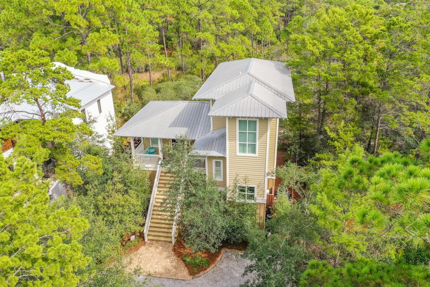 This one owner well maintained home located in Lake Place at Grayton Beach in a highly desirable gated neighborhood along 30A perfect for full-time or vacation living. Overlooking endless green space of the Grayton State Park, the multiple decks, porches and screened porches are perfect for relaxing with a book or entertaining a crowd. As you walk in the second level porch, the open plan seamlessly flows from living space to dining space and kitchen area complete with a large center island. Custom millwork through out home features wall to wall shiplap and tongue and groove ceilings. The three bedrooms all with ensuite bathroom each have its own outdoor space. The true owner suite has an amazing walk-in closet, walk-in shower and private entrance on ground floor.