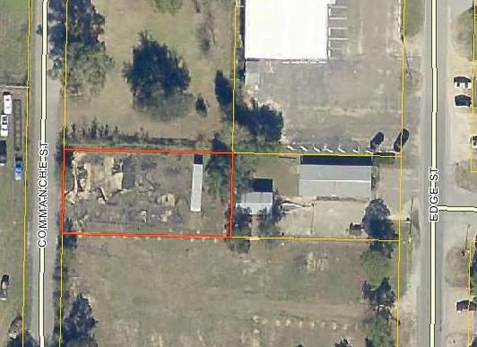 vacant fenced land