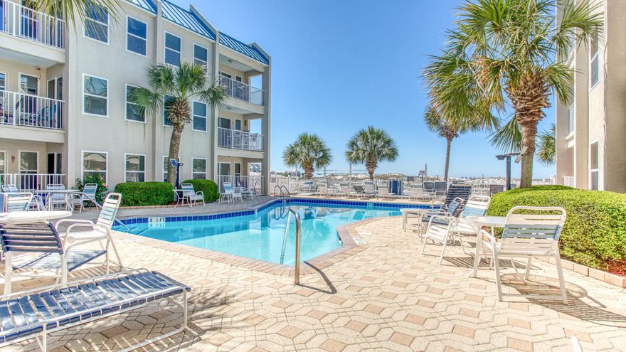 PRICE REDUCTION!!!!!!Units at Poolside Villa don't come on the market very often so act now!!This gated Condo Property has incredible panoramic views of the Gulf, Dunes and the East Pass Jetties.  Unit is on the ground floor Unit with private covered Patio and will be delivered ''Unfurnished'' & ''As Is''.  The Kitchen has upgraded Tile Back Splash and new Appliances & Waster/Dryer.  The Water Heater is 1 Year Old.  The Cabinets were upgraded, Crown Molding installed and the ''Popcorn'' texture removed from the Ceiling.  Tile Flooring throughout Unit.  The Private Beach Access is just outside the Gate from the heated community pool!!