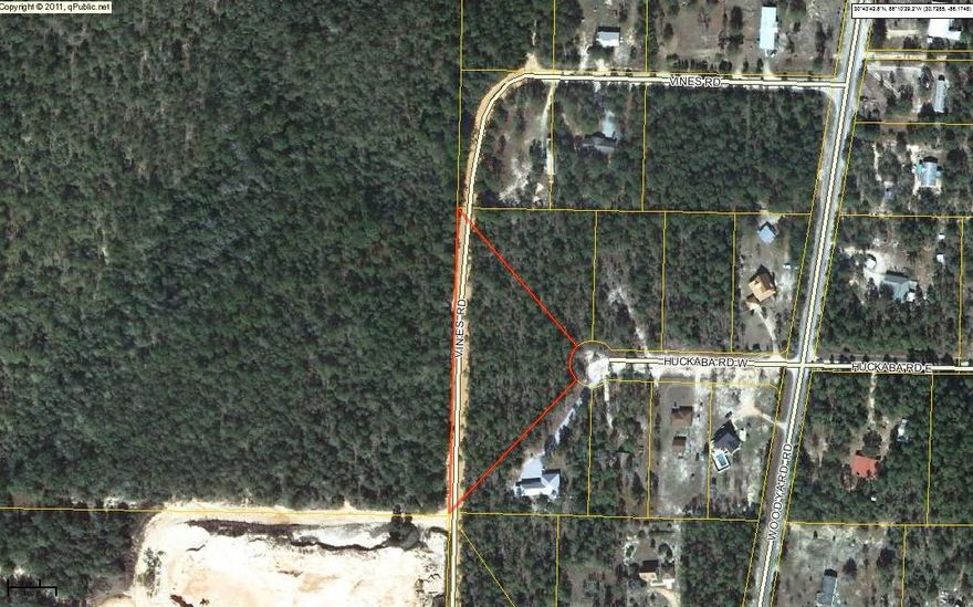 This 2.74 acre lot is in a great location off Woodyard Rd. and only minutes to Walmart & other shopping. Woodyard Rd. comes out on Bob Sikes Rd, making it a 30 minute commute to Niceville and Eglin AFB as well. Lightly wooded lot just off paved road. Public water is available (tap fee would need to be paid). Septic required. Electric nearby. Won't last long!