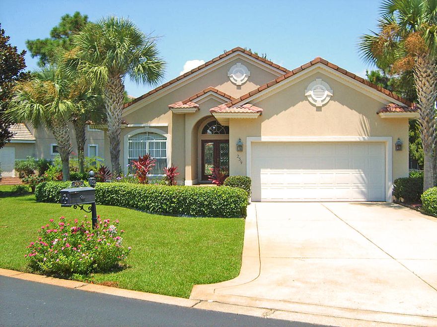 WOW! Wake up every morning to a wonderful view of a beautiful lake only 46 feet away from the back screened in porch by looking through a 8 ft. tall triple all glass sliding door located off the dinning room and kitchen. BONUS! This home is MOVE IN READY! Looking to find a well maintained and clean home inside and out in a GATED COMMUNITY located only 1/4 mile from the beautiful beaches of Destin! This home has recently been updated with brand new carpet and a fresh coat of paint throughout the home. Entering the home, you step into a spacious great room that includes the living room, dining room, and an open kitchen with a breakfast bar. And just for a few extra features, how about vaulted ceilings, a gas fireplace with a mantle, and custom built-in cabinetry in the living room.