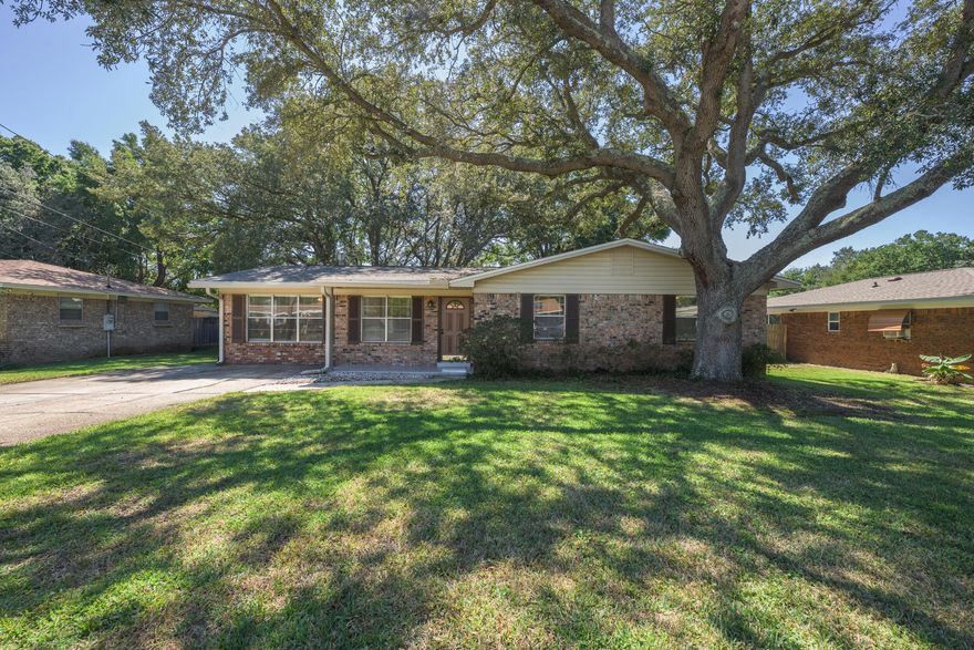 Searching for a charming, well maintained ranch style home with no HOA?  Centrally located, this home is situated near shopping, dinning, downtown and beautiful beaches-this is the ONE! Upon entering the home, you will be warmly greeted by the newly painted, large living area with fireplace flanked by built-in book shelves. In the kitchen you will find a brand new range, dishwasher and garbage disposal-2025! The roof was replaced in 2022, water heater in 2019, HVAC in 2023. The covered back porch will provide the perfect space for holiday get togethers with friends and family. Fort Walton Beach HS is .7 mi and to Hurlburt Field it is 4.8 mi. Make your appointment. You do not want to miss this ONE!