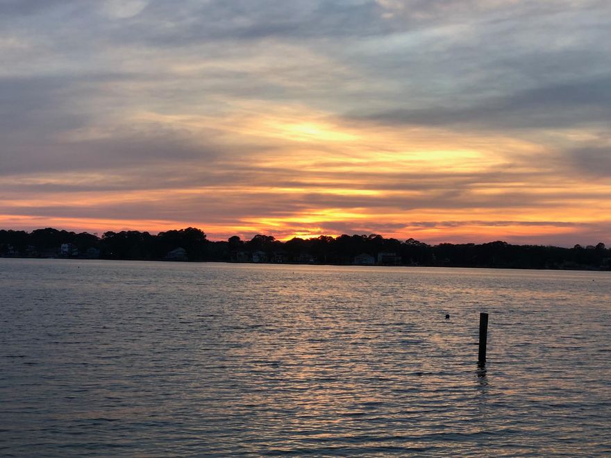STUNNING western views from this HIGH lot on the deep, protected waters of Rocky Bayou. This ''one of a kind'' property is the perfect place to build your dream house with no worries of storms or need for flood insurance! The wooded lot is studded with hard wood trees with a gentle slope towards the water. There aren't many lots like this left in Niceville so you'd better hurry before this one is SOLD!