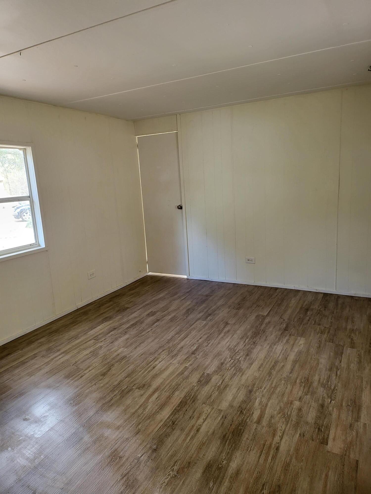Recently remodeled 3/2 mobile home. New butcher block countertops, new base cabinets, new flooring, toilets, etc. There are 2 regular bedrooms and a guest bath. The 3rd bedroom has a half bath. This unit is spacious and the covered front porch is an added bonus. Pets allowed with deposit.