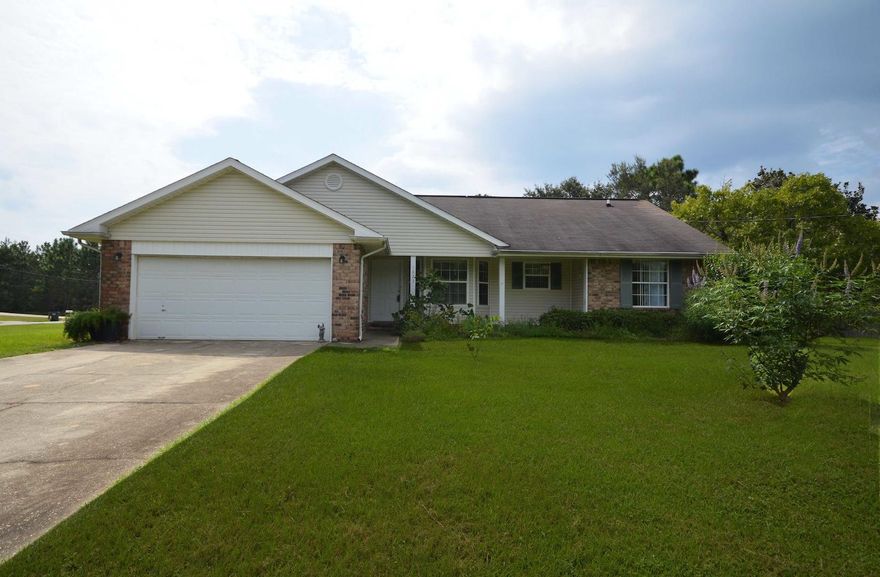 Great Location in Holley by the Sea; Lovely 3 Bedroom, 2 Bath all brick home with open and split floor plan on a Large corner lot! Lawn pump sprinkler system, Fireplace in Living Area; All tile floors, no carpet; Flamingo is close to clubhouse with all the amenities like 3 Pools, Exercise room, Tennis Courts, and Club Room; A great location in the lifestyle community with quick assess to the bases, beaches, schools and services. This home has been maintained nicely. The features of this home are the open dining/breakfast bar, all electric appliances, all inclusive with microwave, refrigerator, range, and dishwasher. Ceiling fans in all bedrooms and the great room. This large parcel and is one of the limited few in Holley By The Sea that are greater than 1/2 acre lots.