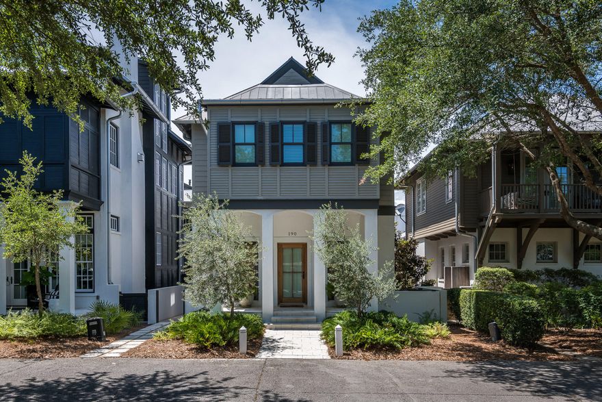 A classic and charming coastal home located in the heart of Rosemary Beach. This exquisite and pristine residence, with garage and carriage house, was completely renovated in 2015 by architect Frank Greene, boasting high-end custom features throughout. As you enter the home from the front porch you are welcomed into an inviting open living, dining and kitchen area, with an abundance of light and exposed beams. A gas fireplace in the dining area creates a warm, cozy feeling. Large kitchen marble island and designer lighting are just some of the amazing elements of this space. Climbing the stairs to the second floor, you will notice the incredible custom washed pecky cypress wood wall, and the beautiful red stained glass windows that were rescued from an old home in Louisiana