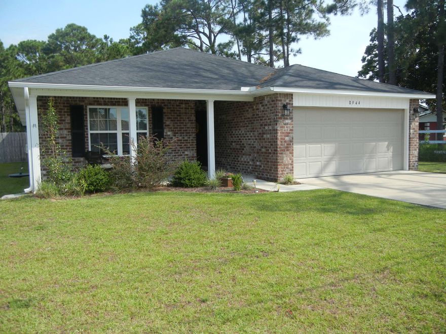 This home features a 20 FT rear covered porch W/ French doors off of the master suite. It's located on an extra deep lot, East of the Navarre Beach bridge and close to Hurlburt. You'll love the open floor plan and stainless steel appliances! The home just received a brand new fridge in May of 2017, it also offers 3 dimensional 35 year shingles. Dimensions to be verified by buyer.More Photos Coming Soon!