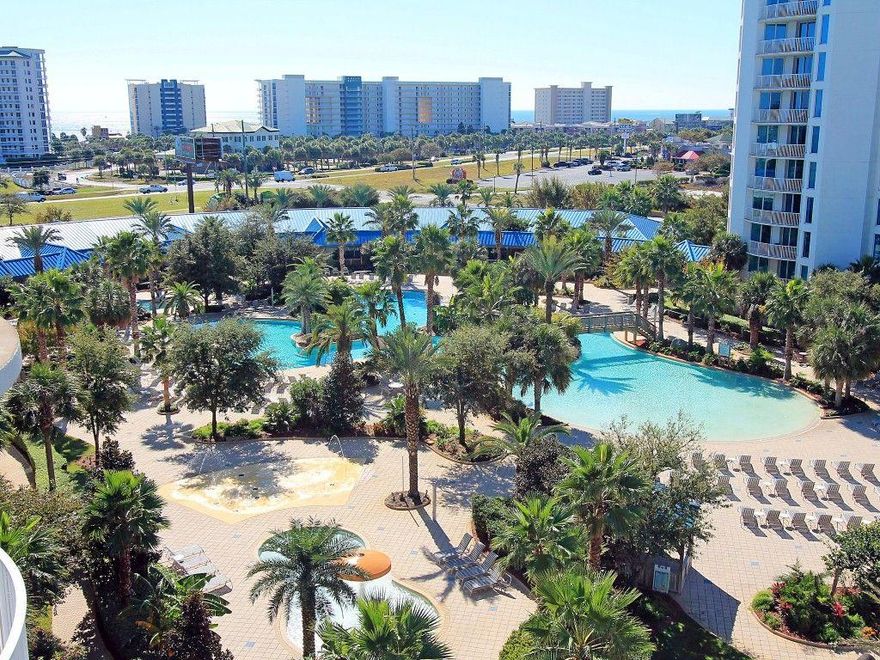 One of the most desired views from the the Palms Resort is one that overlooks the pool. Welcome to your view from your balcony! This unit is a 2BR/2BA which sleeps 6! Sleep comfortably on your Master King size bed while your guests sleep in the 2 twin size beds in the other spacious bedroom! Both rooms and living rooms have been equipt with large flat screen tv's! Gorgeous furnishings to make you feel at home. Spacious kitchen with granite to prepare meals and entertain guests! You have your own washer & dryer to make life easy! The 11,000 square foot is DESTIN'S LARGEST LAGOON POOL!You'll be blown away by the 5 dancing waterfalls, spacious lounging area and A+ shuttle service to local areas/beaches.There's a 21,000 gallon STEAMY heated pool, children's area+MORE!Hoa fees include electric