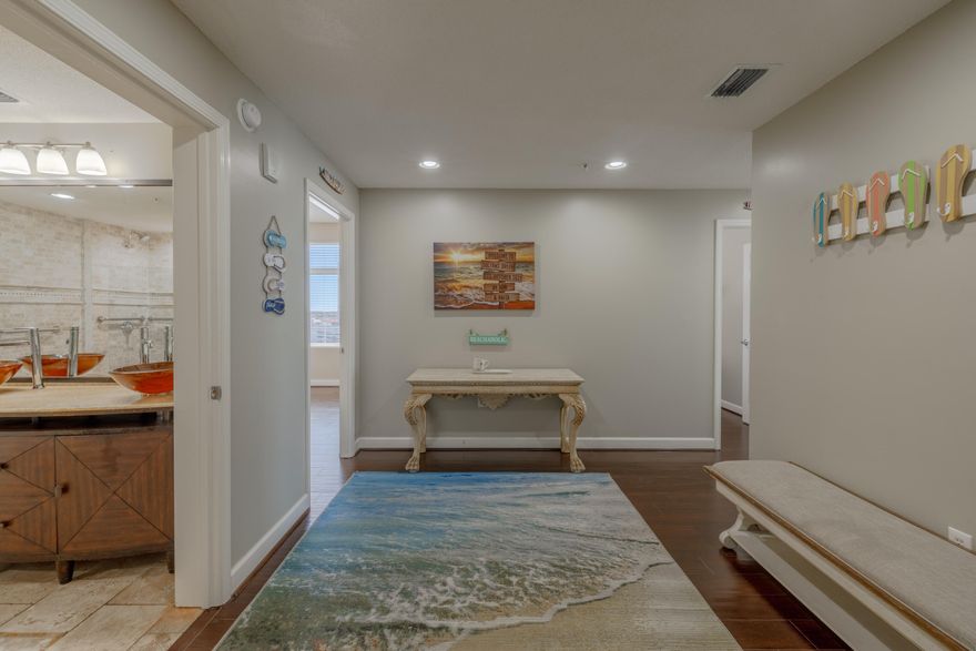 Nicely appointed and decorated condo in the heart of PCB with sweeping Gulf views of the much desired 5th floor of Sterling Reef. This condo is spacious and airy with side windows that only an end unit can provide. Beautiful kitchen with island and adjoining plushly furnished living room with unobstructed views from the open space floor plan. You will not see another bathroom like this condo has anywhere on the beach. Oversized custom tile shower and custom bowl top vanities are simply stunning. The large 7X27 balcony deck overlooks the Gulf and has phenomenal views. Beachside master suite opens up to the balcony as well.Beachfront pool and garage parking are sure to please. Close to restaurants, shopping, marinas and entertainment. Seasonal beach chairs included. This is a must see!