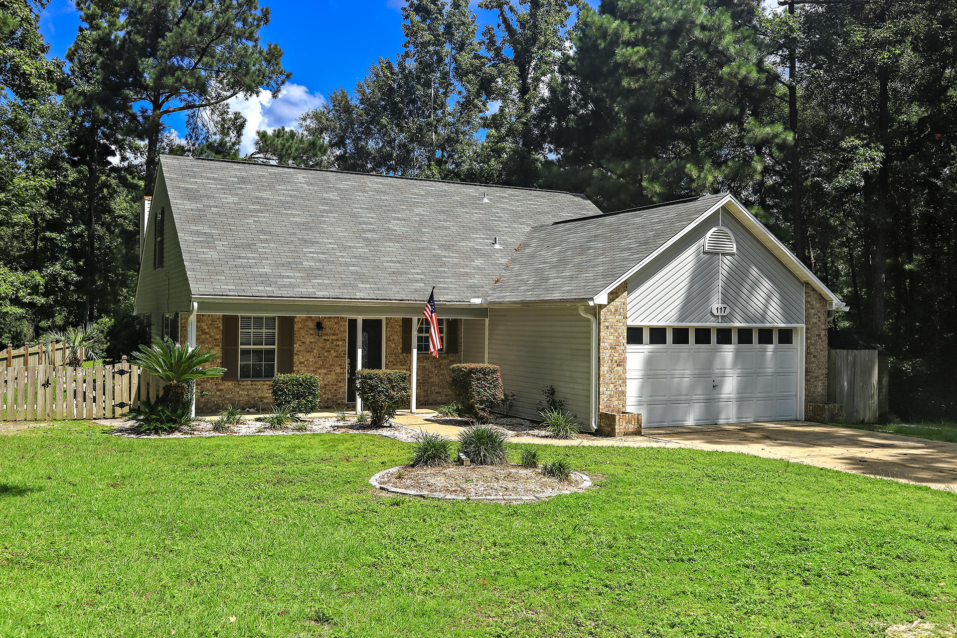 This is a great house with a beautiful view of the 18th fairway of Foxwood Country Club! Roof installed in 2013 per seller. Nice large lot with many lovely shrubs! There is an eat-in kitchen with all stainless steel appliances in place. Tile back splash and granite counter tops. Most of the flooring in the house is the larger ceramic tiles and the master bedroom has a lovely hardwood floor. The existing carpeting is like brand new! Formal dining room off of the foyer across from the kitchen. The great room is very large and has a corner fireplace. The master suite in downstairs with a large bedroom, beautiful master bath has a garden tub and a separate shower plus two vanities with granite counter tops and two large closets with built-ins.