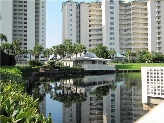 First time ever, a Grand Villas east end two story penthouse is on the market. This well maintained 5 bedroom and 5 bath gulf front unit offers the utmost in luxury and privacy. The huge 370 sq ft wrap around balcony with a gas grill offers panoramic views of the gulf, sunrises, sunsets and the sugar white sand beaches. The second floor has an office, an additional bedroom and a huge kids playroom/bedroom. The main living area has a 24 ft ceiling with electric hurricane shutters on all the lower windows. This rental restricted high rise offers its own security gate, underground parking, gulf front pool and spa, fitness center, a large lobby level community room and an extra outdoor storage closet. Resort amenities include walking trails, reflecting pools with flowing fountains,