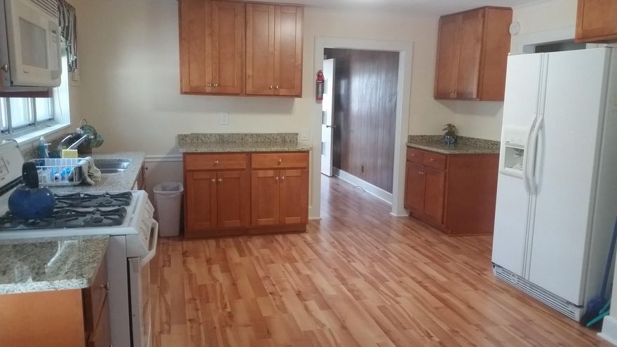 This property offers more than what you would expect. A renovated gem just waiting for you to move in. The home features 2bdrms w/1bath in the main house & separate permitted/insulated building that can be used as a ''Man Cave'', guest suite, craft area or office, that features it's own kitchen and full bathroom & hot water heater! Also a 5 foot wide covered front deck/porch, just add chairs and swing! Instant enjoyment. The main house features a ''Sun Room'' in front and new wood laminate flooring that extends from the living room to the newly renovated and extended eat-in kitchen with granite counters newer appliances and more. Perfect for first time home buyers, or downsizing. Minutes to both bases,schools,the beaches or shopping. Call today for your exclusive preview of this property